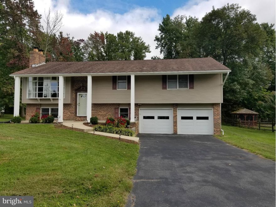 LARGE UPDATED 4 BEDROOM 2.5 BATHROOM BEAUTIFULLY MAINTAINED HOUSE IN MATURE NEIGHBORHOOD. HUGE DECK W/ 3 SLIDERS OFF KIT /MBR & DR. HARDWOOD FLOORS IN LR/DR. NEUTRAL CARPET & NEUTRAL DECOR. UPDATED HALL BATH, NEWER STAINLESS APPLIANCES. EXTRA DEEP 2 CAR GARAGE. 2 FIREPLACES. FINISHED LOWER LEVEL. ZONED HEATING/COOLING. LARGE FLAT .37 ACRE LOT W/SHED.CONVENIENTLY LOCATED TP APG & 95. A MUST SEE!!!!