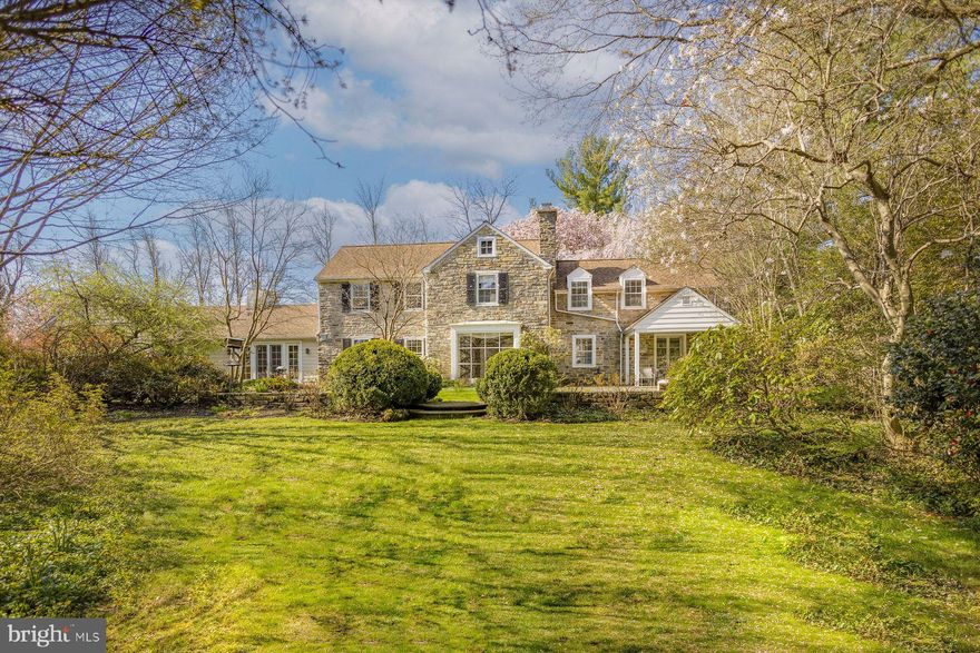 Welcome to 8221 Ardmore Avenue, a beautifully appointed 4–5 bedroom, 3 full bathroom home nestled behind a wall on a picturesque, tree-lined street in Wyndmoor, PA.

This exceptional property offers the perfect blend of space, charm, and location. Inside, you’ll find a flexible floor plan with four generously sized bedrooms and the option for a first floor fifth—ideal for a home office, guest suite, or creative space. Three full bathrooms provide comfort and convenience for both everyday living and entertaining.

Sunlight fills the home, enhancing its warm and inviting atmosphere, while thoughtfully designed living spaces offer versatility for gatherings large and small inside or out. Highlights include a 2 car garage, a mud room with laundry, a family room, kitchen, dining room and large living room. Whether hosting guests or enjoying a quiet evening, this home adapts effortlessly to your lifestyle. 

Step outside and discover truly special grounds—lush, mature landscaping inspired by and featuring plantings from the renowned Morris Arboretum. The result is a serene, garden-like setting that changes beautifully with the seasons, offering both privacy and a connection to nature rarely found in such a convenient location.

Just a short walk from both downtown Wyndmoor and Chestnut Hill, you’ll enjoy easy access to charming shops, acclaimed dining, cafes, and everyday amenities. Commuting is a breeze with nearby transportation options and quick access to Center City Philadelphia.

8221 Ardmore Avenue is more than a home—it’s a unique opportunity to enjoy timeless character, flexible living space, and extraordinary natural beauty, all in one of the area’s most desirable locations.