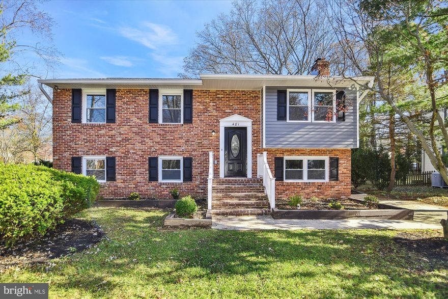 Motivated Seller -  Welcome to the this beautiful renovated open floorplan home, with 4 bedrooms and 3 full bathrooms. Lovely corner lot. Completely renovated inside and out. New roof (2022), New HVAC (2022), New Hot Water Heater (2022), new siding, windows/ doors, plumbing, electrical, and drywall, all NEW.  Recessed lighting throughout the home, well-lit entrance. All interior materials are upgraded and new. Enjoy cooking in the chef-style kitchen that includes, quartz countertops, a quartz island with extra storage, soft close cabinets, new stainless steel appliances, stunning hanging light fixtures, with access to a large rear deck, with wide stairs leading to the back yard. Great for entertaining and family gatherings. Upper-level features,  new hardwood flooring, 3 spacious and bright bedrooms with new ceiling fans, plentiful closet space, and a completely renovated full bath with ceramic tile and beautiful finishes. Owner’s suite with large en-suite bathroom, with stylish vanity and walk-in shower.  The fully finished lower level provides much more living space. Complete with a fourth bedroom,  a fully renovated bathroom, a laundry room, and a family room with a wood fireplace. Lower level flooring is new and 100% waterproof, with upgraded vinyl for easy care and durability. Walk out lower level to the rear yard and a spacious shed for storage. Move into this highly sought-after community! All work is guaranteed by the seller for one year. A MUST SEE! $500 off closings cost with preferred title company and FREE appraisal with preferred lender. No private showings until after the open house. Seller will credit $3000 towards installation of a privacy fence.