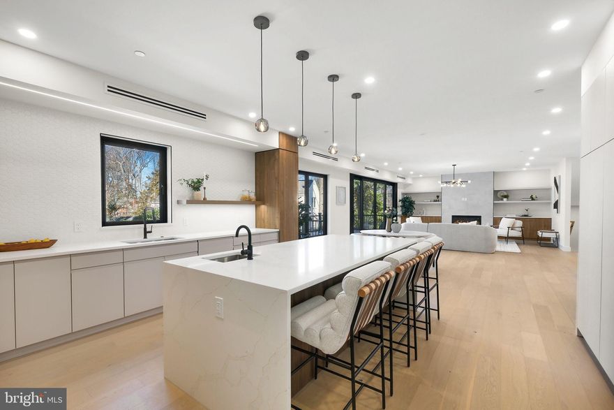 HUGE PRICE IMPROVEMENT! Step into a world where thoughtful design meets effortless living. This brand-new, six-bedroom, five-and-a-half-bath home combines contemporary living with cutting-edge ICF (Insulated Concrete Forms) technology designed for durability, energy efficiency, and water resistance. Thoughtfully crafted with high-end finishes, this home offers elegance and comfort in every detail.At the heart of the home, the gourmet kitchen features a stunning waterfall-edge island and imported flat matte lacquered cabinets from Spain—beautiful, durable, and fingerprint-resistant. Top-tier JennAir stainless steel and built-in appliances make cooking effortless. The large main living area flows seamlessly from the kitchen, offering the perfect layout for entertaining. Anchored by a gas fireplace, the family room is bright and inviting, making it an ideal gathering spot for family and friends. Engineered hardwood floors, ceramic-tiled bathrooms, and soaring 9-foot ceilings enhance the home’s timeless design.  





The upper level invites you to relax and unwind. A spacious bonus living area adapts to your needs, whether as a playroom, media hub, or office. The primary suite is a private sanctuary featuring double walk-in closets and a spa-like bath with a rainfall shower and heated floors for indulgent mornings and serene evenings.





For extended stays or family time, the fully finished basement offers a private kitchenette, bedroom, and full bath—ideal for multi-generational living or hosting guests in style. Everyday convenience shines with a second-floor laundry room, complete with a washer, dryer, and utility sink, as well as a tiled mudroom equipped with cubbies and storage to keep life organized.





This home embraces energy-efficient living with high-performance aluminum windows, LED lighting, and a high-efficiency ventilation system that keeps you comfortable all year round. The exterior is equally remarkable, with its composite shiplap siding, a 50-year asphalt roof, and custom metal railings. Entertain effortlessly on the welcoming front porch or spacious rear deck, while the extra-wide driveway and insulated garage with sleek aluminum-and-glass doors complete the home’s modern appeal.

Established sought-after neighborhood in an ideal location this is a short drive to Wildwood Shopping Center and Georgetown Square featuring Balducci’s, DSW, CVS, Le Pain Quotidien, Capital One, and more
Walking distance to Rock Creek Trail - where two miles of the 14-mile trail wrap the entire west side of Parkwood, taking bikers, walkers and joggers on a journey through the woods by the water. Easy access to I-270 and I-495 as well as walking distance to NIH, Walter Reed National and Medical Center Metro and 
minutes to numerous dining, shopping, and entertainment options including Downtown
Bethesda, Westfield Mall, and Pike & Rose