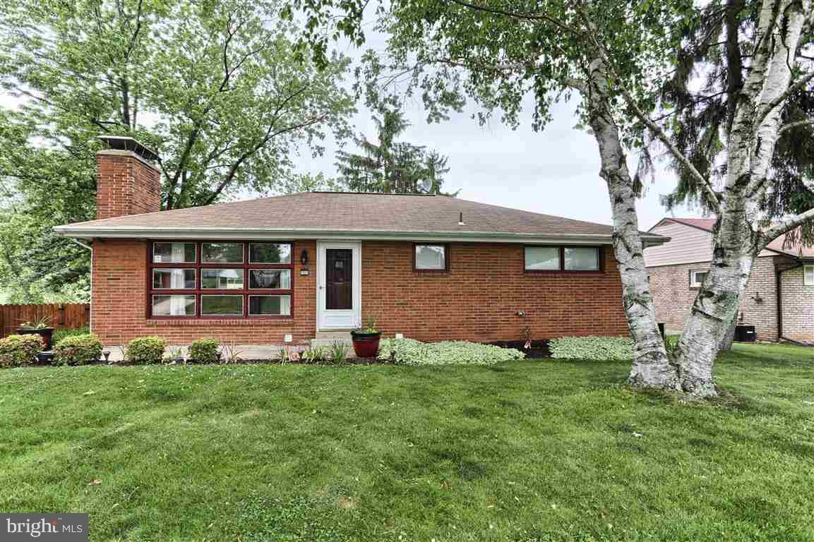 Awesome location between Harrisburg & York! This wonderfully done rancher w/3 BR's, 2 BA's, finished basement, 1-car rear entry garage and gorgeous fireplace has it all! Remodeled bathrooms & kitchen enhanced this home. The fireplace displays built-in bookshelves, new insert & beautiful slate! All hardwood floors have been refinished. Great backyard that is fenced-in and backs up to the field.