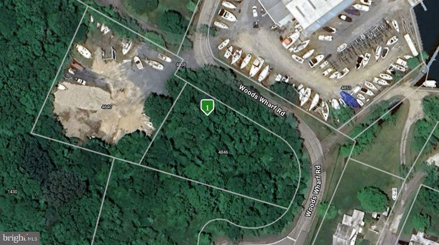 Vacant Lot Ideal for Expansion or New Venture.  Perfect for Boat Storage or New Building.  Leverage its proximity to high-demand recreational areas for profitable boat and trailer storage,  or business vehicles, or develop the lot into a commercial  building for your business,  or to lease the space to a business who is looking to serve the local community.