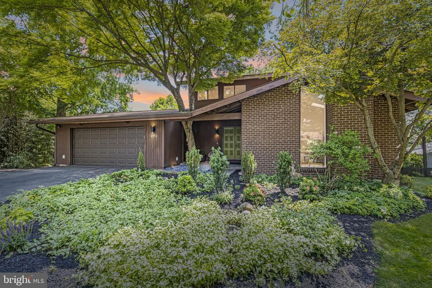 You’re going to love this stylish home located in sought-after Potomac! Nestled on the wooded edge of Falls Road Golf Course, this contemporary three-level home features a nice open floor plan with hardwood floors and beautiful natural light from the several oversized windows and skylights throughout. The main level is home to a spacious combination living and dining room with modern lighting, a large sunroom that is ideal for a home office or additional living space, powder room, and updated kitchen with ample cabinet space, upgraded countertops, and stainless appliances. Entertain or relax in the additional additional living room that features a brick fireplace and amazing architectural details including a tall ceiling with skylights and a floor-to-ceiling window to provide stunning natural light. Off the main level, there is access to your large private deck that has serene views of your well-maintained deep backyard. Upstairs, there are a total of four bedrooms and two full bathrooms, including the relaxing primary bedroom suite with a full en-suite bathroom. The additional three bedrooms are spacious with hardwood floors and nice closet space, plus the full updated bathroom features a large vanity for extra storage and counter space, plus a nice shower, and updated lighting. The versatile lower level has additional living space and a bonus room that can be used as a bedroom, home office, workout space or art studio - the possibilities are endless! There is also access to your private patio under the deck and the deep backyard that has a nice seating area and mature landscaping for additional privacy. The home has an attached two-car garage with access on the main level. You'll love the Potomac location - this home nestled along the wooded edge of Falls Road Golf Course and is within minutes to swimming and tennis clubs, local parks and playgrounds, Potomac Village Shopping Center, Giant grocery store, CVS Pharmacy, and so much more! You'll absolutely LOVE calling 9712 Eldwick Way home!