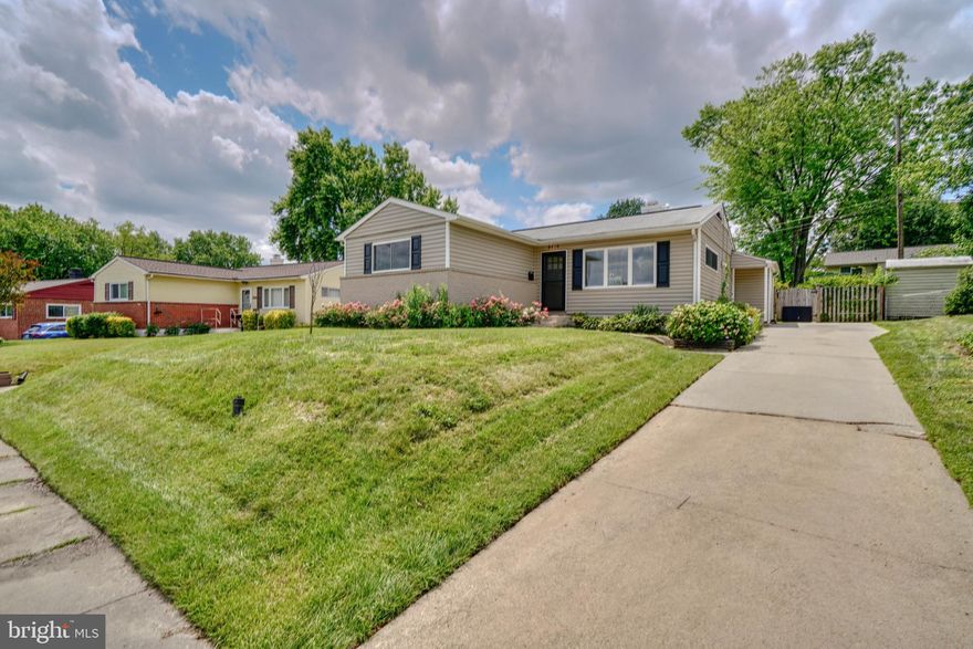 Perfectly set atop a knoll in Kings Ridge, this attractive rancher provides all the advantages of one level living along with plenty of private outdoor living space. Fully updated less than ten years ago, everything inside is still young and fresh with a modern aesthetic. True one level living with bedrooms, bathroom, laundry, and living space all without a single stair in between. Bamboo floors provide a stylish and durable base throughout the home. Freshly painted, the home is ready for you to add your personal touches and style. The bright kitchen includes shaker style cabinets, granite counters, stainless steel appliances, an island with seating, and a perfectly placed window over the kitchen sink looking out to the beautiful backyard.  Doors, windows, electrical, and plumbing, were all updated with the renovation not long ago and a brand new sump pump was added in 2024. Outside spaces received updates as well including siding and the large deck as part of the fenced and level backyard. The driveway provides off-street parking just outside your door. Inside and out, this home provides for an easy living lifestyle.  Convenient at home and convenient in location, so close to amenities of all kinds from shopping to parks and commuter routes to locations beyond. Come take a tour and send in your offer quick before another lucky buyer calls this their own!