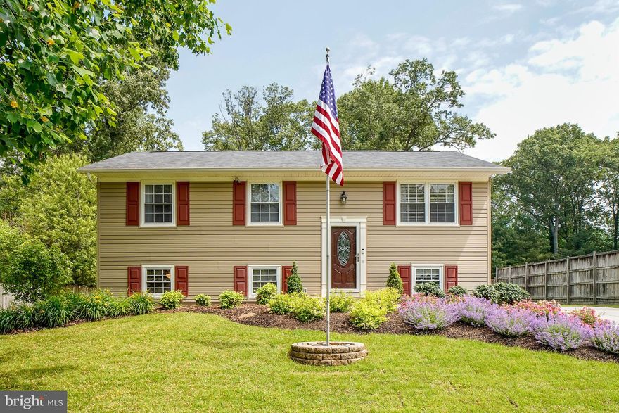 This gem is something special. Get ready. The pride this  owner  took in this property is instantly apparent when you pull up and notice the outstanding curb appeal and newly concreted driveway with double extension, freshly planted zoysia grass with newly installed underground sprinkler system, impeccable landscaping and high-quality siding with energy saving moisture wrap and recently replaced roof. It doesn’t stop outside. When you enter, you discover a home in immaculate condition. Kitchen offers tons of natural light and exits to the deck while boasting a new tile floor, granite countertops and a new backsplash and sink fixtures. Each of the 4 bedrooms are well-sized and suitable for all your needs…family, kids, guests, office, exercise. Bathrooms are tastefully updated, the wood floors on the main level shine like new and there is fresh paint throughout! Spacious and inviting basement family room has all new high-end carpet, fresh paint and new trim. It would seem this would be enough, but it keeps going. Even the laundry room is well thought out with ample storage, and a water system large and complex enough for a home twice this size! If you’re outdoor people, we’ve saved the best for last…this backyard is unlike any you’ll find in this community, massive, flat and absolutely beautiful. This is one outstanding property looking for an owner that will appreciate it like this seller!