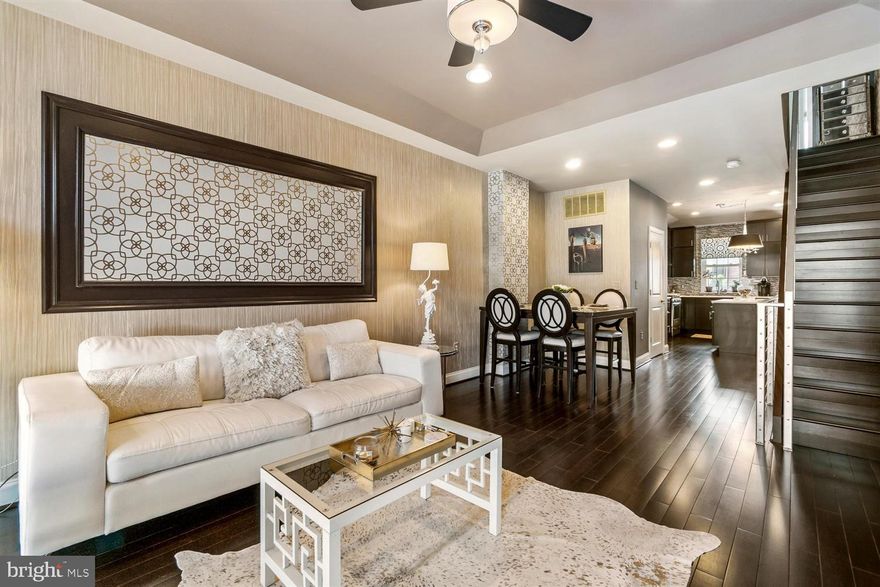 Renovated & Unique 3 Bedroom, 2.5 Bathroom Home  With Open Floor Concept, Exposed Brick, Bamboo Floors, & Bonus Kitchen In Lower Level! Welcome To Greektown, Where The Food Is Wonderful, Close Proximity To New Shopping Center Near Bayview, All Major Highways & More! This Town Home Offers So Much  Character! The Living Room Brings In A Ton Of Natural Light & Tray Ceiling, Dining Area Has Gorgeous Accented Wall Paper Contrasted By Custom Industrial Railing, & Kitchen With Quartz Counter Top, Large Island, Stainless Steel Appliances & Glass Back Splash. Make Your Way Up The Custom Stairs To The 2nd Level & Be Greeted By A Master Bedroom With Built-Ins, Tray Ceilings, Large Windows & Wall to Wall Carpeting. The Hallway Bathroom Includes A Dual Vanity Sink, Jacuzzi Tub,  & Separate Stand Up Shower. The Lower Level Is Great For Guests & Rentable Space With Its Own Kitchen, Full Bathroom,  & Separate Outside Entrance. The Newer Installed Rear Deck Is Wonderful For Entertaining, With Extra Room On Patio (Potential Parking Pad). Schedule A Tour Today!!