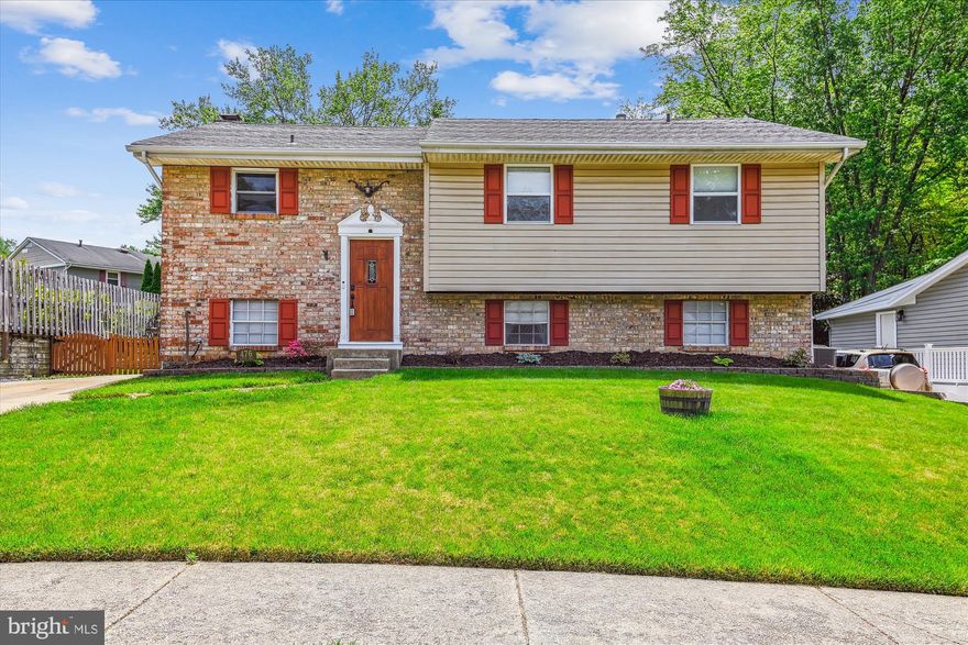 Beautifully updated 3 bedroom and 2 full bath home with composite deck and fenced in yard! The kitchen features gorgeous cabinets with stainless steel appliances and granite counters. Upstairs features 3 bedrooms and a fully renovated full bathroom (2020). Enjoy the durability and modern look of Lifeproof LVP flooring installed in the upstairs living space in 2023. Downstairs features a den, family room with fireplace, a full bath, and laundry room. The downstairs bathroom was updated in 2020 with a new toilet and flooring.  Step outside to a beautiful composite deck with vinyl railings, redone in 2022—perfect for entertaining. The fully fenced yard offers privacy and space to enjoy the outdoors. Ready to move in!