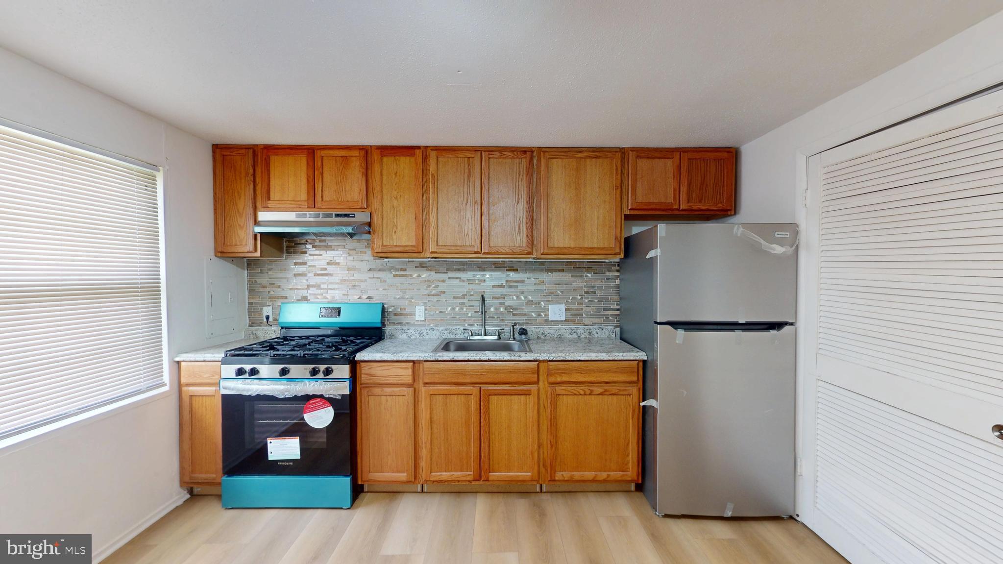 7302 BARLOWE ROAD S-210