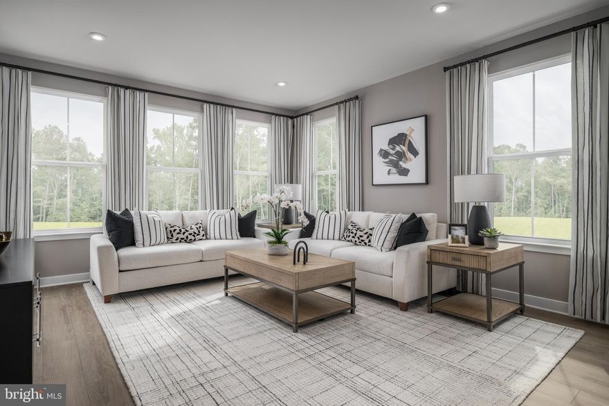 Welcome to the To-Be-Built BALLAD Floorplan at the brand new MADISON GREENS community in Ranson, WV! Luxury townhomes that live like a single family home with backyards and a prime location walkable to Potomac Towne Center and right off Rt. 9. Only 20 min from Frederick County, MD and 30 min from Loudoun County, VA. Step inside through the welcoming ground-floor foyer, leading to a versatile oversized recreation room that can easily transform into a private guest suite with the addition of a full bath. Upstairs, an expansive great room offers the perfect setting for relaxing or entertaining. The adjoining gourmet kitchen, complete with a generous island, walk-in pantry, and open dining area, makes cooking and gathering a true delight. On the third floor, discover two comfortable secondary bedrooms and a full bath. Retreat to your luxurious owner’s suite, featuring dual walk-in closets and a spa-like bath with double vanities. Every Ballad includes a private backyard — the perfect spot for enjoying fresh air or giving your furry friend room to play. Come visit our model home at: 1741 Destrier St, Ranson, WV, 25438