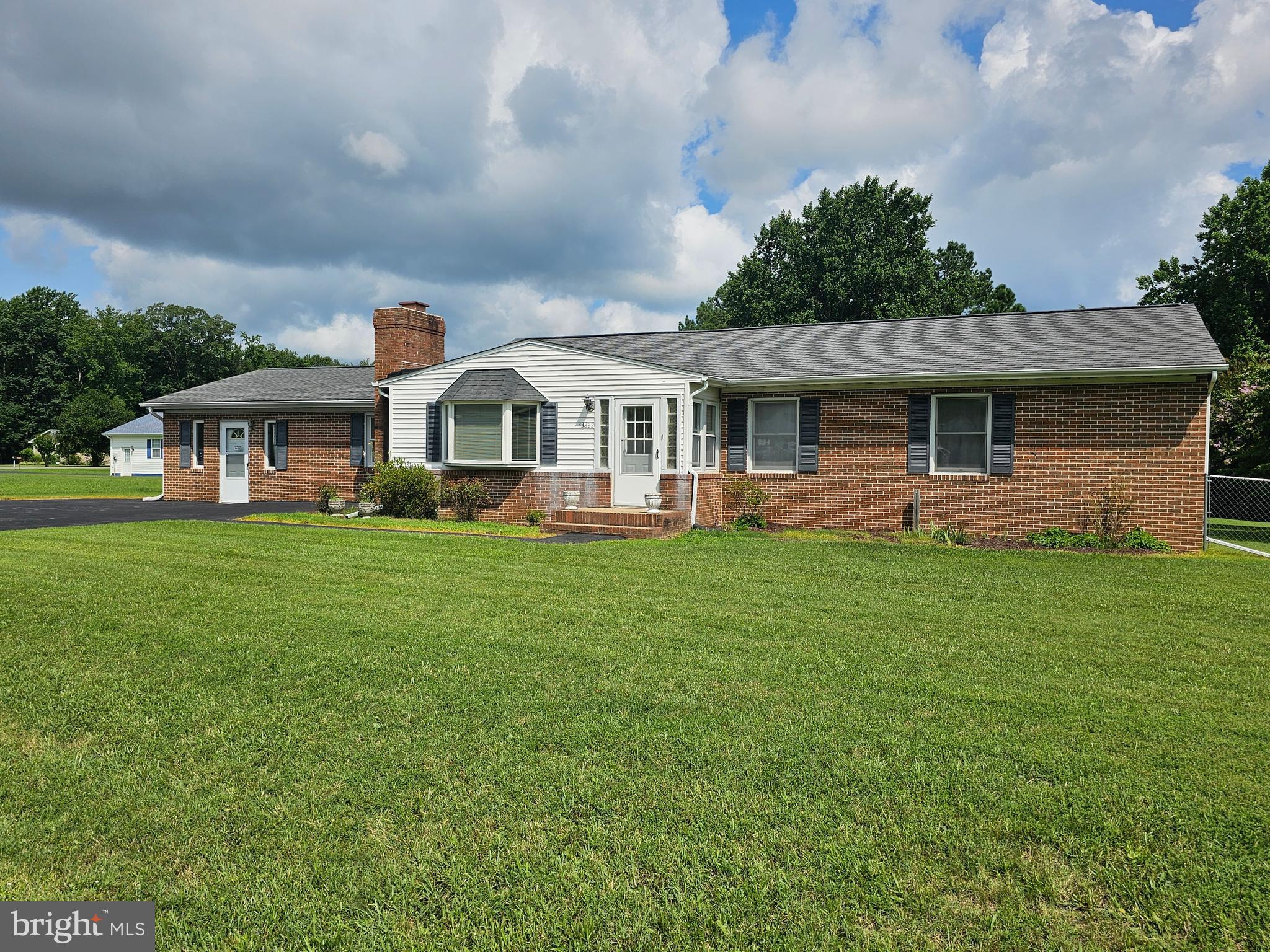 Tucked into a quiet neighborhood, this charming 3-bedroom, 2.5-bath home offers a spacious 1,812 square feet of living space on a generous, level lot. Outside you'll find a fully fenced rear yard—ideal for backyard games, pets, or just some relaxing fresh air. A classic brick exterior adds character, while the detached garage comes with added storage space for tools, bikes, or that growing collection of mystery boxes you swear you’ll go through someday. Inside, a welcoming country kitchen is ready for your next culinary adventure—or at least a strong cup of coffee. Additionally, there is a cozy kitchenette located off a large family room, perfect for movie nights or game-day get-togethers. With multiple entries, guests can come and go with ease, and you can enter from gardening without tracking mud across the main entrance. The primary bedroom provides a comfortable retreat and two additional bedrooms for family or guests. The home also features an updated heating and cooling system, providing year-round comfort. Whether you’re hosting friends in the backyard, enjoying a peaceful afternoon in the family room, this property offers the space, comfort, and location to match your lifestyle.