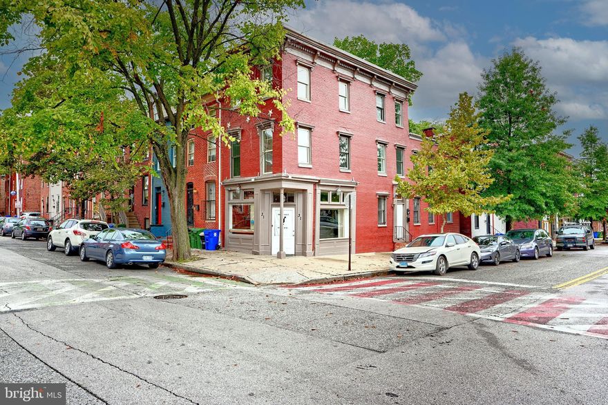 Price just reduced! Welcome to this versatile 3-unit corner building, perfectly positioned diagonally from the newly renovated Hollins Market! This property offers a fantastic opportunity for investors and business owners alike, situated in a vibrant neighborhood that has recently undergone significant revitalization. The first floor features a spacious commercial space, previously operated as a restaurant, providing high visibility and potential for various business ventures—whether you want to revive the culinary scene or introduce a new concept. Upstairs, the second floor boasts a charming 1-bedroom apartment, perfect for tenants seeking a cozy living space, while the third floor offers a convenient efficiency unit, ideal for singles or short-term rentals, further enhancing your investment potential.

With its prime location just steps away from the bustling market and conveniently close to UMAB Hospital and Downtown Baltimore, this property stands out for its accessibility and foot traffic. The ongoing revitalization of the area promises growth and increased demand, making this a terrific long-term investment opportunity. Don’t miss your chance to own a piece of this dynamic neighborhood! Whether you're looking to invest, start a business, or explore creative living options, this property has it all. Schedule your showing today and envision the possibilities!