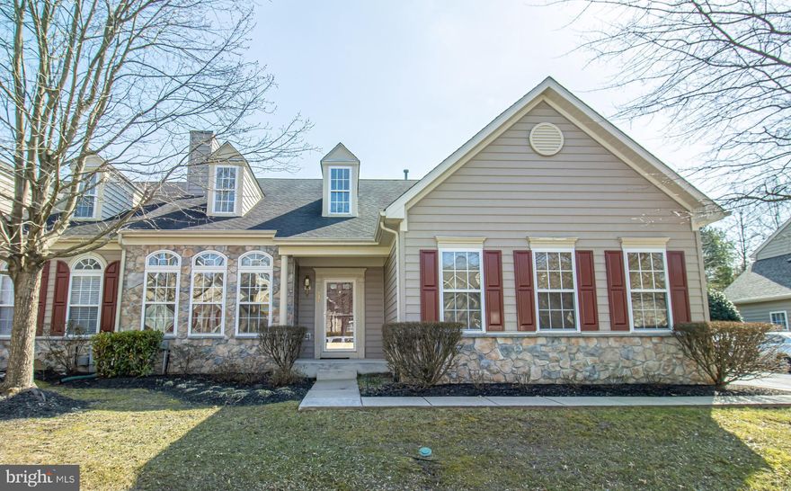 Stunning 3 bedroom and office, 2 full and 2 half bath End Unit Townhouse Villa located in the Glyndon Trace gated community is just the home you're looking for! Features include 2 story foyer, soaring vaulted ceiling, gleaming hardwood floor, open living/dining room with 3-sided gas fireplace, main level laundry/mud room with front load washer and dryer, 2 car side load garage, walk-in closets in all bedrooms, ceiling fans with lights, recessed lights, large utility/storage room, fully finished lower level and more. Kitchen offers counter bar, center island with electric, plenty of 42-inch cabinets, Corian counters, cooktop, double wall oven and breakfast area with table space. Sunroom off of kitchen boasts an abundant amount of natural light, has a vaulted ceiling and sliding glass door to the 21x14 maintenance free deck. Convenient 1st floor primary suite offers a walk-in closet, private bath with soaking tub and separate shower.  2nd story overlook doubles as a library or sitting area and has a generously sized walk-in storage closet. Upper level full bath has a soaking tub with jets. Community features include gated entry with security cameras, inground pool with hot tub, clubhouse with exercise room, jog/walking path and more! Pool, trash, recycling, water, sewer, snow removal and much more is included in the condo fee. Condo association handles all exterior and lawn care so you don't have to.  Not FHA approved, conventional may need to be 10% down (confirm with lender), VA approved. Take a look today!