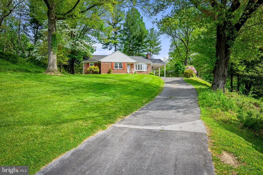OFFER DEADLINE: PLEASE SUBMIT ALL OFFER BY SUNDAY, 5/5 at 5PM.  Welcome to your secluded retreat nestled in the heart of Timonium, offering tranquil one-level living on a spacious nearly acre-sized lot. This mid-century rancher boasts all the privacy you desire, set back in a quiet cul-de-sac yet conveniently located for easy access to amenities and highways.
Key Features:  Location: Tucked away in a secluded cul-de-sac in Timonium.  Lot Size: Nearly an acre of private, beautifully landscaped grounds.  Home Style: Mid-century rancher with a traditional layout.  Bedrooms: 3 bedrooms on the main level, including a primary bedroom with an en suite.  Bathrooms: 2.5 bathrooms (1 full, 1 half, 1 en suite).  Living Spaces: Spacious living room with a cozy wood-burning fireplace.  Flooring: Beautiful wood floors throughout the main level; brand new carpeting in the lower level.  Upgrades:  Replacement windows, newer roof, recently painted interiors.  Outdoor Space: Level private backyard accessible from lower level.  Additional Features: Oversized carport doubles as a porch; quiet and peaceful neighborhood.
As you step into this well maintained home, you're greeted by the warmth of the wood floors that flow seamlessly throughout the main level. The living room, complete with a charming wood-burning fireplace, provides a cozy space for relaxation and gatherings. The main level also features three bedrooms, offering comfortable accommodations for family and guests. There is a large closet on the main level where laundry could be relocated to the first floor.
Downstairs, the lower level provides ample additional living space with brand new carpeting. Here, you'll find an extra bedroom and a convenient half bath with new flooring. Stairs from the lower level lead directly to the private backyard, offering a perfect blend of indoor-outdoor living.
The oversized carport not only provides shelter for your vehicles but also doubles as a delightful porch during the warmer months, ideal for enjoying the serene surroundings.
This custom-built home has been lovingly cared for by its second owner, ensuring it's in excellent condition for its new residents. Don't miss the opportunity to experience this hidden oasis, where peace and privacy await in a quiet neighborhood setting.
Schedule a visit today to discover the charm and comfort of this secluded cul-de-sac gem in Timonium!