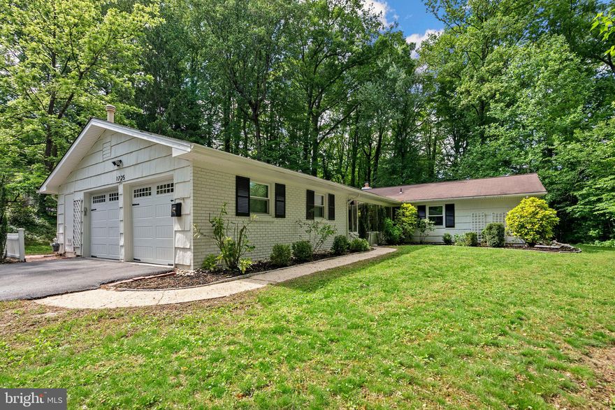Welcome to 1725 Stratton Road — a one-of-a-kind home nestled in the heart of Crofton Park, offering exceptional privacy, space, and character. Set on a rare .77-acre wooded and fenced lot, this property backs directly to the 13th green of the Crofton Golf Course, creating a serene backdrop that’s hard to match. Inside, this beautifully maintained home features two spacious living areas, each with a brick hearth wood-burning fireplace, and a layout that blends warmth and function. Maintenance-free flooring runs throughout, creating a clean and classic look. A bright breakfast room with built-in cabinetry offers the perfect space to gather, while the updated kitchen features newer appliances (2023 & 2025), making it ready for everyday living and entertaining alike. Just off the kitchen, you'll find a private patio ideal for outdoor dining and entertaining, allowing you to fully enjoy the peaceful setting and lush surroundings. Additional recent updates include new windows (2021), a new water heater (2024), two new chimney liners and additional chimney improvements (2018), driveway upgrades and sealant (2020), and Duct Armor for the ductwork (2018) — all adding value and peace of mind. Located in the highly desirable Crofton Triangle and within the Crofton High School district, this home offers unbeatable convenience with easy access to shopping, dining, parks, and commuter routes to DC, Annapolis, and Baltimore. Don’t miss your chance to own this rare gem backing to the golf course in one of Crofton’s most established neighborhoods!