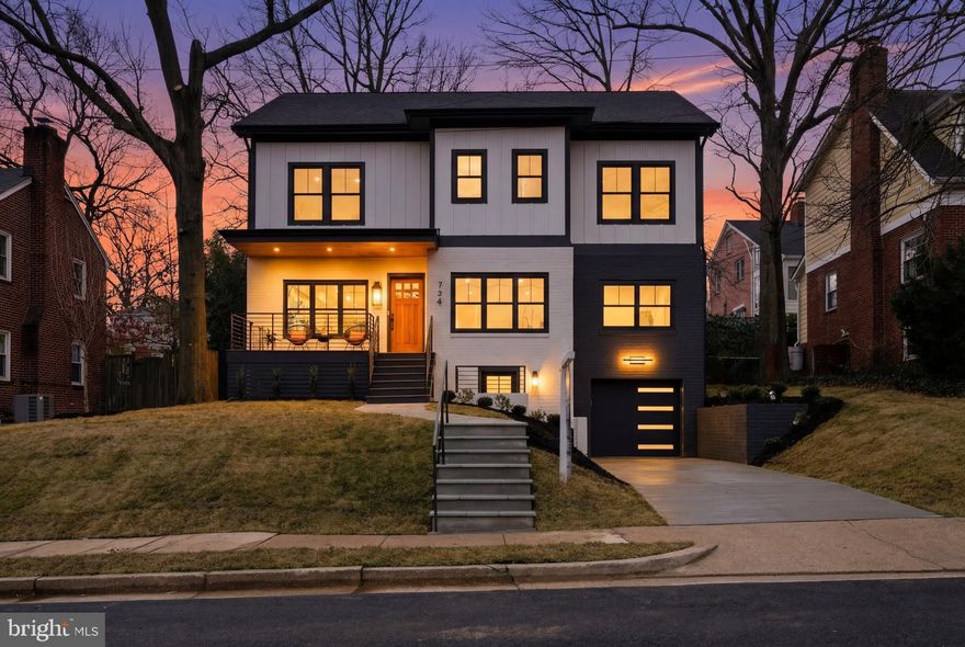 OFFER DEADLINE MONDAY 3/2 AT 3PM

NEW, NEW, NEW! Welcome to 734 26th St S, a beautifully expanded and fully renovated top to bottom home offering 7 bedrooms, 5 full bathrooms, and nearly 5,000 square feet of refined living space. Inside, you’ll find an inviting open-concept layout complemented by engineered hardwood floors, a gas fireplace, coffered ceilings, custom iron staircase railings, and high-end finishes throughout.

At the heart of the home is the designer kitchen, featuring quartz countertops, a continuous full-height backsplash, and a waterfall island, seamlessly connecting to an expansive dining room ideal for entertaining. The second level hosts four bedrooms, three full bathrooms, and a spacious laundry room. The primary suite offers two closets with custom built-ins, a luxurious frameless glass shower with a large bench, and a private washroom.

The home continues to impress with a fourth-level recreation room spanning the full width of the house, featuring vaulted ceilings and exceptional flexibility for work, play, or relaxation. The lower level provides additional living space with a wet bar, full-size refrigerator, and dishwasher, along with an additional bedroom, full bathroom, extra laundry hookup, direct garage access, and a separate entrance—ideal for guests or extended living.

Outdoor spaces are equally inviting, beginning with a custom stone walkway leading to an elevated front porch. Off the kitchen, a covered sitting area overlooks a fully fenced private backyard. Set on a quiet suburban street, this home offers rare tranquility while remaining walkable to Crystal City and Pentagon City, multiple Metro stations, and Reagan National Airport. Washington, DC, Old Town Alexandria, and Del Ray are all within a 10-minute drive, delivering the perfect balance of peaceful living and unbeatable commuter convenience.