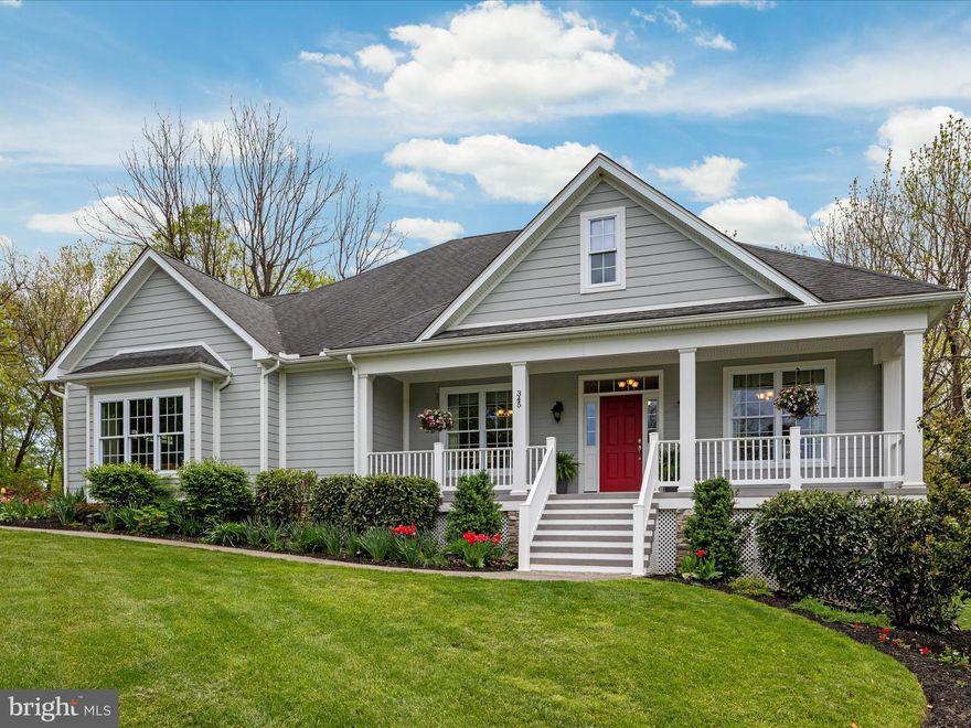 Immerse yourself in the elegance of this Southern Living inspired home situated on a little over 2 acres in sought after Shepherdstown Estates.  No stone was left unturned in this CUSTOM BUILT home with 2 x 6 construction, extra insulation and upgrades throughout. From the moment you step onto the expansive southern-style front porch, you'll be greeted with a sense of grandeur, welcome, peace and tranquility that continues to flow throughout the entire home. Enter into the open foyer and be instantly greeted by the comfort, charm, grand and easy living lifestyle that this beautiful home exudes. Flanked on either side of the foyer you'll find a spacious home office with rich cherry, custom built-in cabinetry prevailing with character while providing a warm and convenient work space; and a formal dining room with crown moulding and large windows that allow natural light to flood the room creating a warm and inviting space to gather family and friends. 

Beautiful hardwood floors lead you from the foyer to the heart of the home where you'll find the great gathering room adorned with a wood burning fire place where you can relax by the warm glow on a chilly evening, built-in cabinetry and crown moulding that add a touch of character and elegance to the open concept layout, a large kitchen island that creates a  chefs work space for preparing meals and gather family and friends. The great gathering room is perfect for the modern living life style. Finally, from the great gathering room,  french doors lead to the spacious screened, maintenance free, rear porch that looks out onto a private oasis with beautiful green space and mature landscaping creating an idyllic space to relax and unwind after a long day. This stunning, impeccably maintained 4 bedroom, 3 bath home offers a spacious main-level primary suite with gas fireplace, walk-in his and hers closets and a luxurious primary bath with heated floors; a second spacious bedroom also occupies the main level. The oversized third bedroom with sitting area is tucked away on the upper level offering a sense of independence and privacy. The expansive, finished, lower level boasts a huge gathering space, spacious bedroom, large full bath, utility room, dedicated storage room, new flooring and a side walk-out into the meticulously maintained yard. The possibilities are endless for the lower level of this amazing home. There's plenty of room to create a home gym, game room, media room, or perhaps an in-law suite that offers privacy and comfort for extended family or guests or generational living.

345 Shevda Way, Shepherdstown, Wv  is not only a serene retreat less than 2 miles from downtown Shepherdstown, Wv with casual and fine dining, shopping, entertainment, community events, farmers market, outdoor recreation, national and county parks, new local library and Shepherd University but it's also a commuters dream come true with close proximity to rail stations and commuter routes to the DMV area. Don't miss the opportunity to make this house your forever home in a community that offers an unparalleled lifestyle. **Professional photos coming soon**