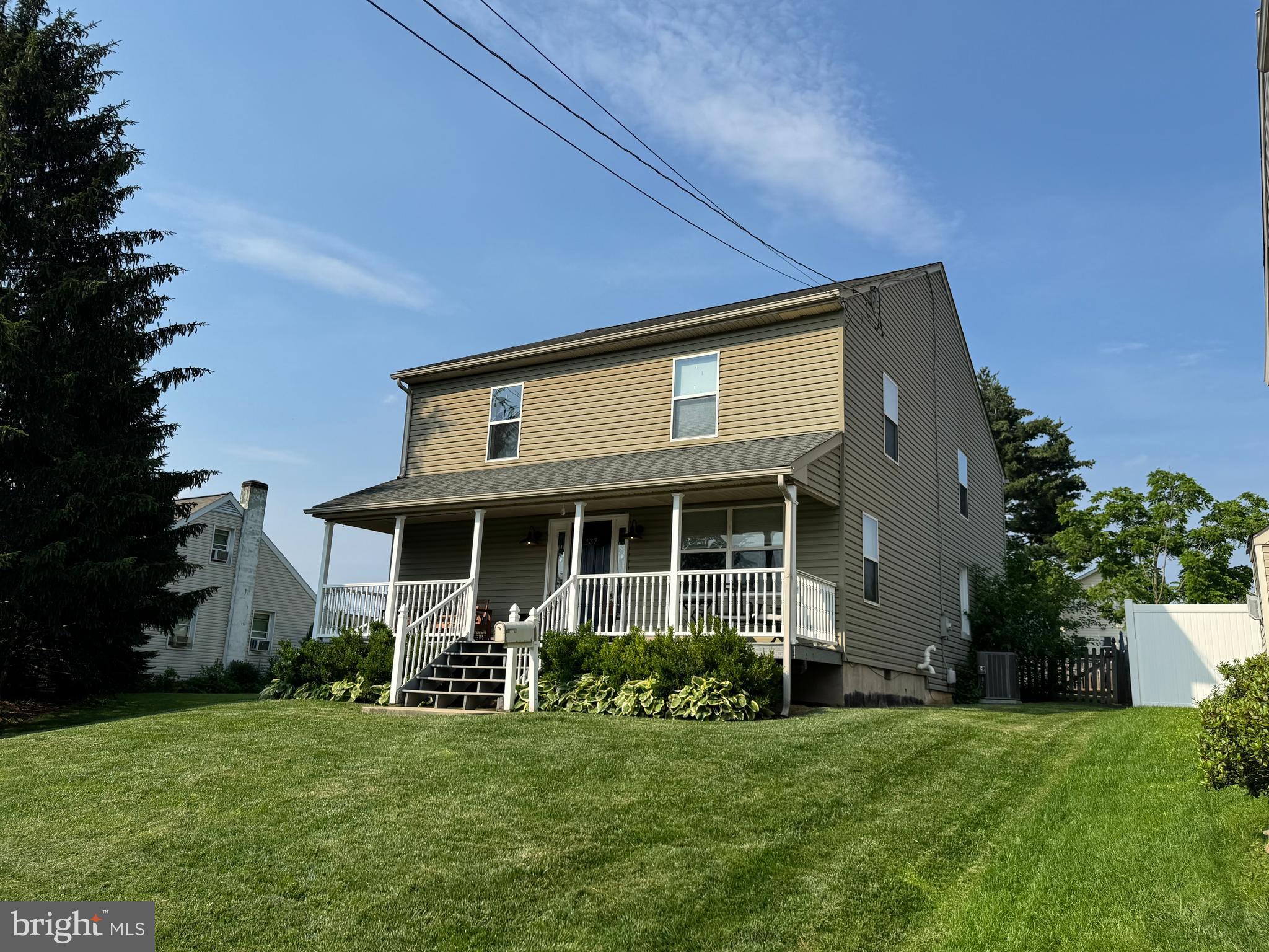 Welcome to this well-maintained 2,790 sq ft colonial with 4-bedroom, 2.5-baths and 1-car garage. Situated on the outskirts of Souderton Borough, this residence features an elegant porch offering elevated views of the surrounding landscape. Enter the front door and find an open floor plan boasting hardwood flooring. Perfect for entertaining, the living room is open to the kitchen and dining area. The adjacent study could be converted to any room you want! The eat-in kitchen provides a functional layout with plenty of cabinet space, while the half bath and access to the mud room are tucked away next to the rear entrance. Upstairs, you will find the primary bedroom includes its own en-suite bath and walk-in closet. The three additional bedrooms are very spacious and share another full hall bathroom. Outside, enjoy the peaceful backyard and mature lawn, ideal for relaxing or entertaining. With strong bones, great flow, and an unbeatable location, this home offers the perfect opportunity to build equity while making it your own. Offering classic curb appeal and a traditional layout, this home has been lovingly cared for and is clean throughout. Don’t miss your chance to live in a beautiful neighborhood known for its community feel, close proximity to shopping, dining, and major routes, located in the Souderton Area School District.
