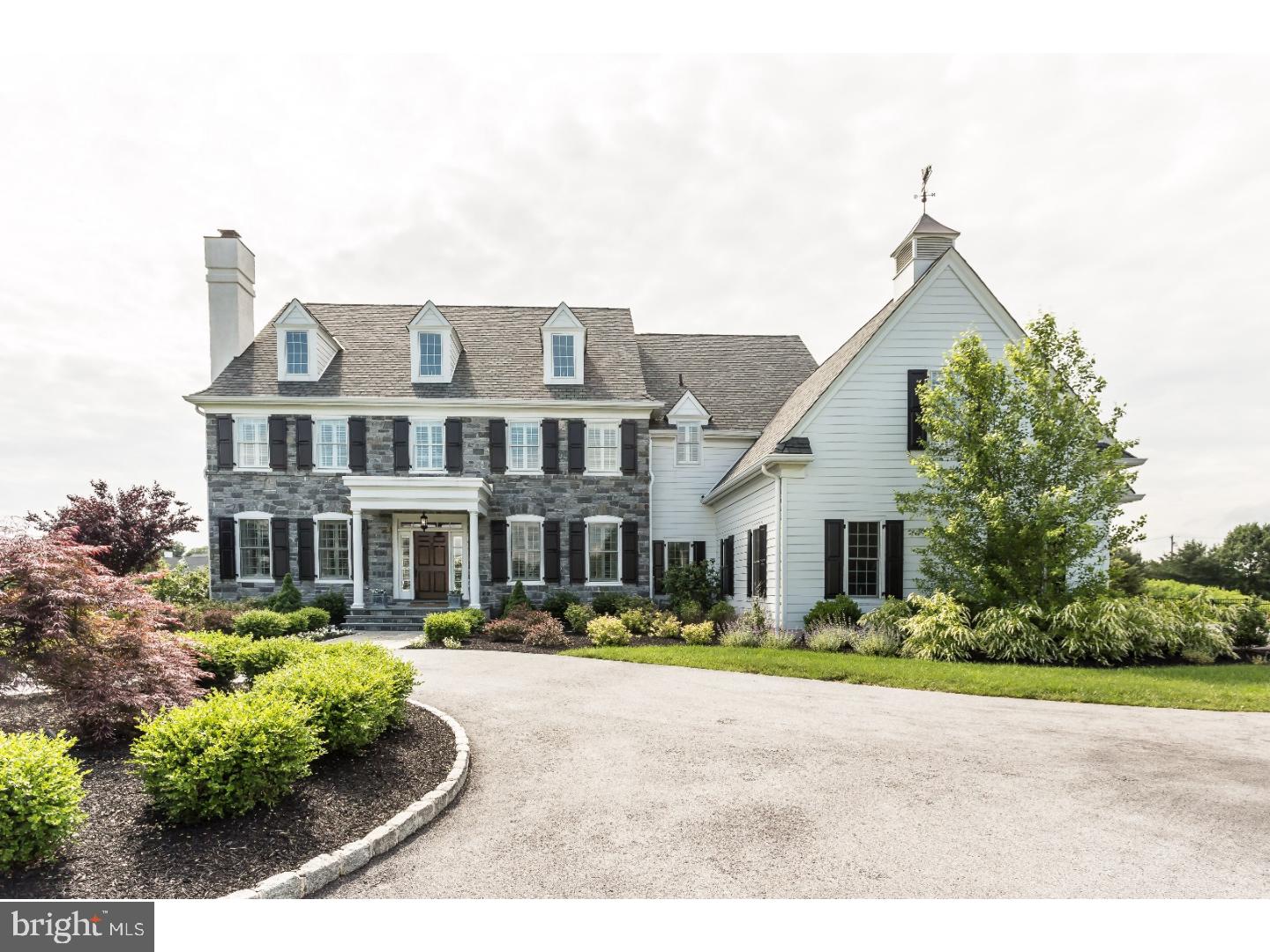 Three-year young "Truscott" model home set on flat 1.5 acre lot in renowned White Horse. Take in the serene landscaping as you drive up the front circular drive with cobblestone accents and stroll along the flagstone front walkway. Enter into this meticulously cared for gem, boasting endless upgrades! With a traditional style and a splash of modern amenities, you will be welcomed into a gracious foyer flanked by formal living room with gas fireplace and a large dining room that lend themselves to entertaining. Gourmet kitchen with oversized center island, marble backsplash, built-in WOLF range and ovens, Sub-Zero refrigerator, farm sink and endless custom cabinetry is a show-stopper. Open floor concept leads you into the family room with wood burning fireplace and is full of plantation shuttered windows overlooking the backyard. Front and rear hardwood staircases lead you to five oversized bedrooms. Enjoy your morning coffee in a sun-filled master sitting area that leads you through double doors into the master suite with tray ceilings, his and hers closets with custom built-in cabinetry, vanity sitting area, a marble master bathroom with his and hers vanities, soaking tub, large rain shower and private toilet room. Two additional bedrooms with ensuite bathrooms, two bedrooms sharing a jack-and-jill bathroom, laundry room and sitting nook complete the second floor. There is an additional staircase that leads up to a fully finished third floor that serves as a wonderful playroom, with many other possibilities. Retreat to your own personal spa in the luxuriously appointed basement with fully equipped home gym, steam room and relaxing television viewing area. Plenty of storage in the attached three car garage, with extended driveway and basketball pole. Enjoy picturesque sunset views on custom built two tier patio with built-in grill, pizza oven, warming drawer, granite countertops, 18' x 55' salt water pool and spa with endless entertaining space in private fenced in backyard. Still room to put your own personal touches! Amazing location just around the corner from Epis. Acdmy., the Ellis Preserve shopping center and a quick drive to endless dining and entertainment options.