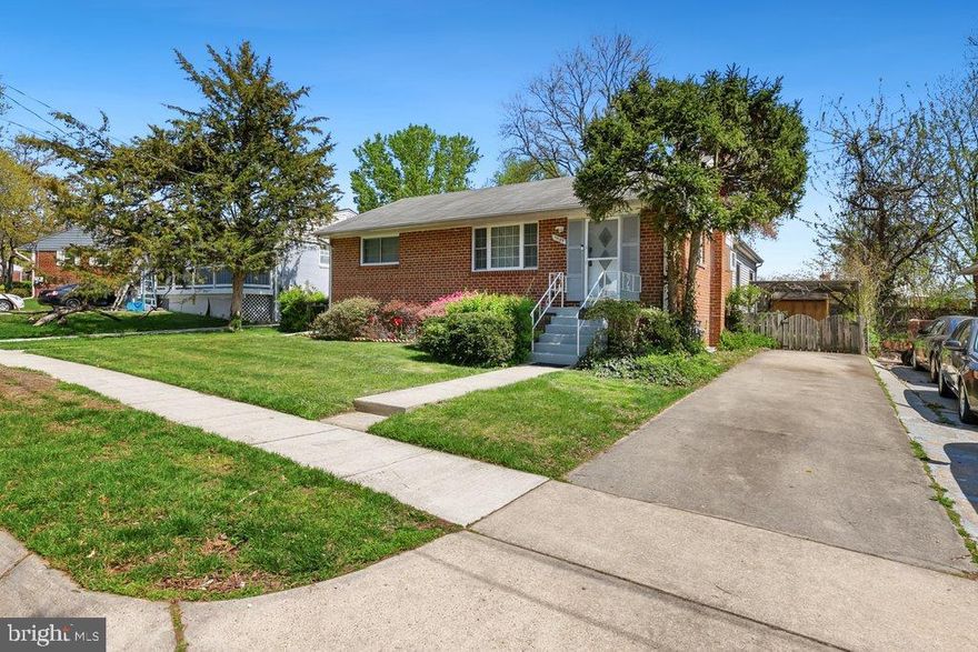 Welcome home to this charming 3 bedroom brick rambler with 2 full baths and 3 lower level guest rooms within 2,200+ square feet of living space in a quiet, established Silver Spring neighborhood. The bright main level features a living and dining room combination with hardwood floors, recessed lighting, and a coat closet. The kitchen features new luxury vinyl plank flooring, a tile backsplash, painted cabinetry, and nice appliances. The three main-level bedrooms include hardwood floors, LED lighting, and mirrored closet doors, while the updated full bath features ceramic tile flooring and surround with a tub/shower. A sunroom addition with a gorgeous wood ceiling, ceramic tile floor and brick wood-burning fireplace, exits to a large wood deck and provides additional living space overlooking the backyard. The walk-up lower level includes a recreation room, new luxury vinyl plank flooring, three guest rooms, a second kitchenette, a full bath with a new shower door, and a laundry/utility room with a washer, dryer, sink, and 2019 water heater. Recent updates include new windows, an updated roof, basement waterproofing, a sump pump, drainage improvements, and a new electric panel. The fenced backyard with two gates includes two storage sheds. Ideally located within walking distance of Wheaton Metro and Westfield Mall.  Also near parks, shopping, restaurants, and commuter routes including I-495, Route 29, and New Hampshire Ave, with convenient access to downtown Silver Spring and Washington, D.C. ***MORTGAGE SAVINGS MAY BE AVAILABLE FOR BUYERS OF THIS LISTING.***