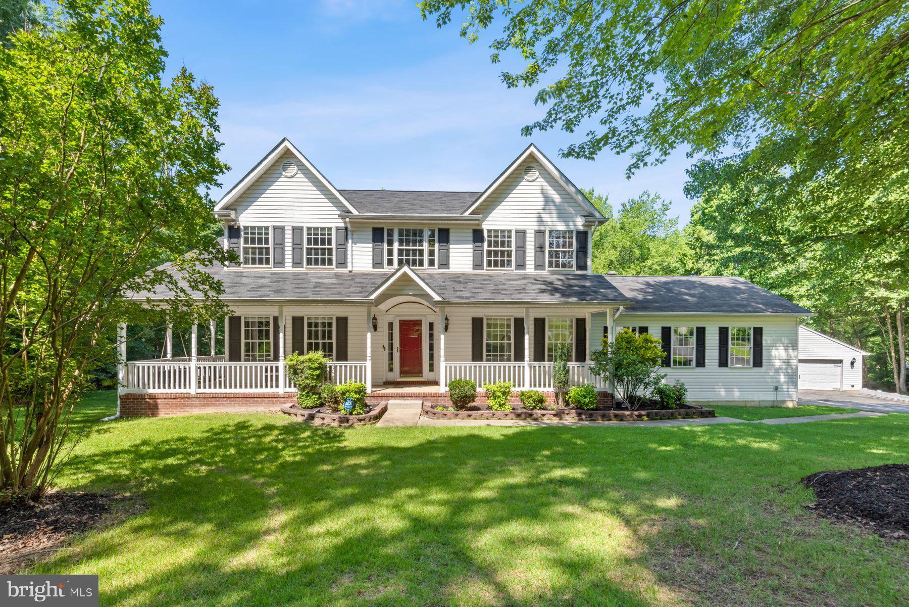 New Price!! Welcome to Your Private Retreat! Love the charm of a neighborhood but crave privacy and space? This beautifully maintained single-family home offers the best of both worlds. Located at the end of a quiet cul-de-sac on nearly 12 private acres just outside of town limits—and with no HOA—this property is a true hidden gem.
The home features three finished levels with 4 bedrooms, 4.5 bathrooms, and flexible spaces perfect for a home gym, office, or storage. The main level showcases luxury vinyl plank flooring (installed 2020), a gourmet kitchen with island and breakfast area, a dedicated office just off the kitchen, and a spacious living room with a wood-burning fireplace—ideal for both everyday living and entertaining.
Upstairs, you’ll find three bedrooms, each with a private en-suite bath and walk-in closet. The primary suite includes two walk-in closets and a renovated spa-like bathroom (2021), with new carpet throughout the upper level. The fully finished walk-out basement offers a fourth bedroom with a private bath and walk-in closet, a large recreation area with a wet bar, and a second fireplace, making it a perfect space for hosting guests or relaxing.
Step outside to a true outdoor oasis—a 10x30 deck (replaced 2020) overlooks a concrete patio (added 2021), a massive 18x44 in-ground pool, and an updated pool house (2022) with a partial rough-in for a half bath and electrical sub-panel. Additional highlights include an oversized 30x24 attached two-car garage, a two-car detached garage with half bath, and a level concrete RV pad with power hookup.
Whether you enjoy riding ATVs, relaxing by the pool, or exploring the property’s one-mile motocross/ATV trail, this home has something for everyone. Private, peaceful, and full of possibilities—don’t miss your chance to own this exceptional La Plata property.
