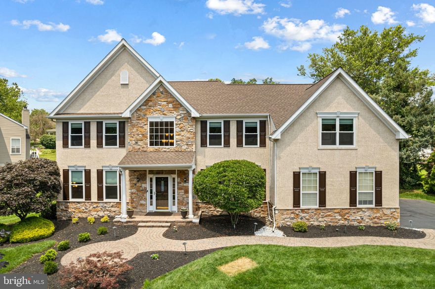 Welcome to 114 Pine Lane E., a gorgeous 3,685 sq.ft. home tucked away on a tranquil street in desirable Wilshire Glen and award-winning Pennsbury School District. The wooded view from the front door is magnificent. This is the one you have been waiting for... move right in to this 4 bedroom 2.5 bath colonial and begin living your best life. The sellers have updated the home during their ownership with over $100K in new systems and cosmetic improvements so you can enjoy carefree living  from day one! From the moment you meander along the paver walkway and enter the elegant 2-story foyer with hardwood floor and curved staircase, you will appreciate how the owners have meticulously maintained this beautiful home. The 1st floor welcomes you with  10' ceilings, an open-concept formal dining room that provides generous space for gatherings large or small and a formal living room (currently used as a billiards room).  If you enjoy cooking, the center island kitchen will be your favorite hang out with "miles" of granite countertops, rich dark wood 42" cabinets, beautiful under-cabinet lighting with a custom tile backsplash, coffee bar, upgraded appliances, double wall oven and a breakfast room that overlooks the striking paver patio and lush back yard. A sliding glass door leads to the large patio for seamless indoor/outdoor entertaining 3 seasons a year. Cozy up with a great book or movie in the adjacent two-story great room centered around a direct vent gas fireplace.  A back staircase leads to the second level. Work from home? The spacious in-home office tucked in the back of the home will provide privacy for remote work. A chic remodeled half bath and convenient laundry room with garage access complete the first floor. The 2nd level offers 4 bedrooms and 2 full baths. The primary bedroom features a large sitting area, walk-in closet, additional single closet, and full ensuite bath. Treat yourself to a relaxing soak in the luxury tub at the end of a long day. Three other large bedrooms share a recently remodeled bathroom with stunning walk-in glass-doored shower, dual vanity and ceramic tile walls.  Most closets in the home are equipped with custom closet systems. Looking for potential extra living area? The full unfinished basement offers an ideal clean slate ready for your future finishes (with Bilco door egress) and fabulous storage in the meantime. Recent updates include new roof, 2nd floor heating and A/C systems, direct vent f/p, 12 high-efficiency replacement windows, refinished wood flooring, upgraded ceiling fans, 2 remodeled baths,  recessed lighting, level 2 EV charger, custom blinds, carpeting and more! Best yet, enjoy a lovely walk into charming downtown Yardley Boro for a cocktail or meal at great bars and eateries, fun shopping and a delicious ice cream, water ice or gelato to go. For longer walks and bike rides, hop on the Delaware Canal State Park towpath and make your way to Morrisville, Washington Crossing, New Hope and farther. Take advantage of Lower Makefield Twp's recreational facilities including Kid's Kingdom playground, 4 outdoor swimming pools, picnic pavilion, tennis, racquetball, soccer, basketball, nature trails and library. Easy commuting to Philadelphia, Princeton/Hopewell, NJ, King of Prussia and NYC via I-295, Route 1, PA Turnpike and local trains. Don't miss this chance to fall in love with 114 Pine Lane E. and enjoy the quintessential Bucks County lifestyle.