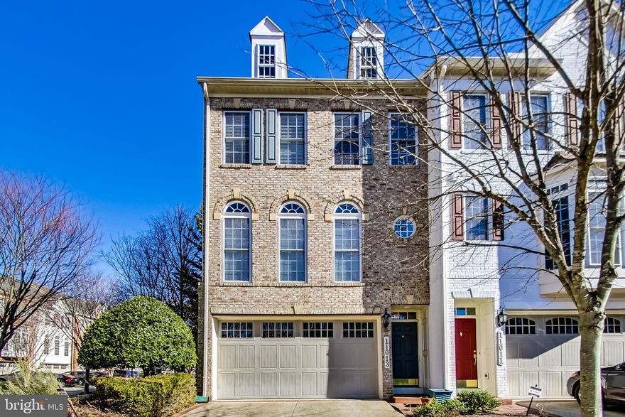 Shopping for a new home?  Don’t look any further!  Welcome to this beautiful and spacious end unit townhome.  The home sits at an impressive 2880 total sq. ft. with floor to ceiling windows with custom blinds and plantation shutters. The living room and sitting room are paired with large bay windows which also add extra floor space to each area, and let’s not forget the crown molding trim on the main level.  The open concept of the home is very rich and inviting with natural sunlight pouring in from all angles of the home.  The natural oak hardwood floors are immaculate and pair perfectly with the ceramic tile in the kitchen which is a dream for anyone from a five star chef to your weekend kitchen warrior.  With over 30 oak cabinets and premium round edge granite countertops, a center island with storage, seating, and black accents, this kitchen is simply beautiful.  The living room, sitting room, and formal dining room all intertwine with the open concept that flows throughout the home so that no matter where you are seated, you have a sense of being connected.  The three sided fireplace that separates the living room from the sitting room is absolutely stunning and a great conversation piece as it so elegantly illuminates the rooms with an inviting warmth on those chilly winter nights.  The upper level has three bedrooms, including the master bedroom which is large with a bonus sitting area, walk in closets with custom closet organizers.  The plush carpets upstairs and tranquil views make you feel as though you’re in a luxury resort.  There are two full baths on the upper level and the master bath is sculpted with a custom two sided glass shower, and an oversized jacuzzi tub.  The lower level of this home currently features office space, workout space, as well as a sitting area and a half bath.  The laundry and mechanicals also have their own enclosed room on this lower level with plenty of space for access and storage.  The lower level has a rear walkout for entry and exit, as well as access to the oversized garage that has plenty of space for two cars as well as extra storage space. The home also features a whole home audio system with built in speakers on the main floor, the walk out deck, the master bedroom and master bathroom.  While sitting within a very short walking distance to several bus lines, the home is also only about four miles from the Metrorail station.  The Maple Ridge Community is a community that has been maintained very well.  The community is very tightknit and is always in high demand for new home owners wanting to move to this community.  This home is everything you've been looking for and more.  It’s just minutes from lots of shopping attractions, fine dining, and major commuter roads. Schedule your tour now, you don’t want to miss out on this one!