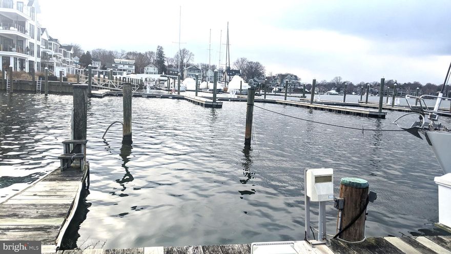 Spring is just around the corner.  Take this opportunity to invest in your own waterfront slip, priced below assessed value!  Relax & enjoy the views, summertime fun in the pool, gather with friends in the party room, get competitive in the game/billiards room, work out in the gym then take a sauna.  It's all here, including 2 gated parking spaces right in the heart of Eastport.  This is one of the few marinas where you can live aboard.  The location of this slip allows easy access in & out of the slip.  Walk to town, shops, restaurants, yacht clubs & more.  This spot is great all year round!  Watch the Eastport Lights Parade with your front row seats.  Make it your summer, weekend or year round place to be.  Call agent for details.