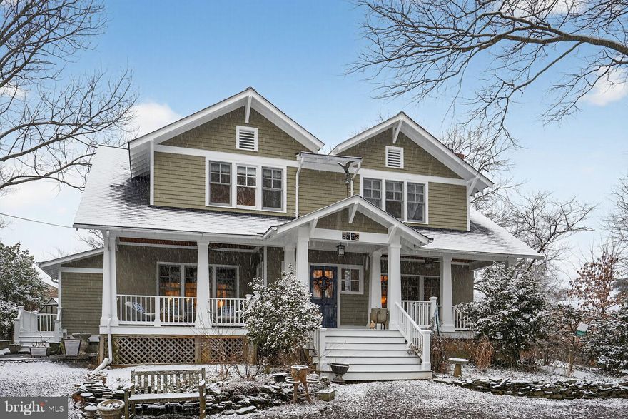 Rare opportunity to own a beautifully renovated 1925 farmhouse on a private, secluded .62-acre lot — plus an additional buildable .18-acre lot — just blocks from shopping, schools, and Metro. Surrounded by mature trees and lush landscaping, the yard feels like a peaceful retreat with exceptional privacy rarely found in Arlington. Sale includes both 5723 27th Street, N and 5715 27th Street, N which is a vacant .18 acre lot for a total lot size of  .8 acres !**. This is an opportunity to buy two lots for a total of .80 acre which is a very rare find in Arlington!

This 4-bedroom, 4.5-bath home blends timeless charm with modern updates and features a light-filled open floor plan, high ceilings, hardwood and bamboo floors, and custom millwork throughout. The gourmet kitchen showcases Caesarstone counters, marble backsplash, farmhouse sink, large island, and premium appliances including a 48" Wolf gas range. Spacious living and dining areas, a cozy family room, and renovated baths — including a luxurious primary suite with soaking tub and dual-head shower — offer comfortable everyday living and great entertaining space. **
The finished walk-out lower level adds flexible rec space and a full bath. Outside, enjoy flagstone patios, stone fireplace, fire pit, front porch, fruit trees, shed, and greenhouse — perfect for relaxing or entertaining in your own private oasis. **
Zoned HVAC, numerous system updates, and sought-after Nottingham/Williamsburg/Yorktown schools. A rare combination of character, land, privacy, and location in Arlington!