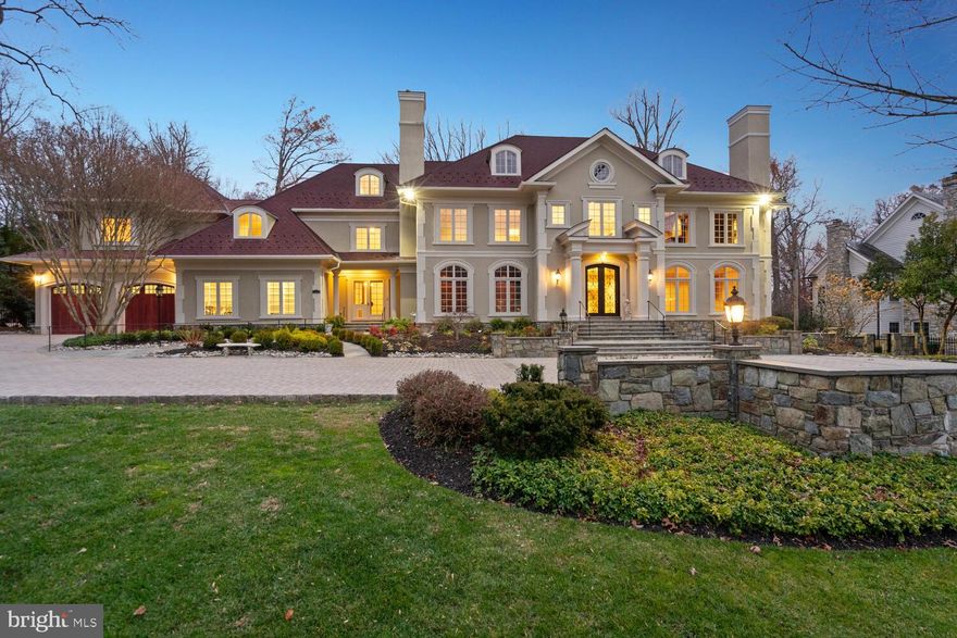Newly renovated expansive and meticulously crafted French Georgian-inspired mansion located in the heart of Bethesda, Maryland. Designed by architect Mark Sullenberger from Custom Design Concepts and constructed in 1994, expanded in 2004 and renovated in 2024, this property spans over 18,000 square feet and is set on a lush 1-acre lot. It boasts an array of luxurious features including:
- 7 Bedrooms and 13 Bathrooms: This masterpiece includes 7 bedrooms, 9 full bathrooms, and 4 half bathrooms, ensuring ample space for a large family or numerous guests.  
- Elevator Access: An elevator services all 3 levels of the home, providing convenience and accessibility.
- Artistic and Architectural Details:  The designed limestone entry foyer, creating a dynamic entrance that extends up the main staircase. The home features a formal Living Room with a gas fireplace, a grand Dining Room with custom molding, and a fully paneled mahogany library with a coffered ceiling and hidden private powder room. Brand new gleaming red oak hardwood floors with custom mouldings.
- Entertainment Spaces: The property is designed for both entertaining and comfortable living, featuring a large great room with high ceilings, a custom antique bar, and an oversized English-style fireplace. A fully finished lower level includes brand new flooring, a gathering room, full bar, wine cellar, game room, and in-law suite, leading out to an extensive stone patio with a swimming pool and waterfall.
- Gourmet Chef’s Kitchen: Equipped with brand new Storm Gold Venniza quartz countertops, New Stainless steel double ovens, two dishwashers, double SubZero refrigerators, a commercial hood range, new commercial custom gas range and new indoor gas grill. The kitchen also features oversized pantries, including a prep area kitchenette and a separate room for dry storage.
- Outdoor Amenities: The grounds include manicured landscaping, extensive terrace, a sports court, heated pool with waterfall feature, a gated circular stone driveway, and a 5-car heated oversized garage.
- Energy Efficiency and Security: The home is equipped with geothermal HVAC and a 150k whole house generator, ensuring comfort and security. New security system.
This masterpiece represents the pinnacle of luxury living, blending exquisite design with functionality and comfort, ideal for both grand entertaining and private enjoyment. 
This masterpiece is ideally located near Downtown Bethesda, Metro, public transportation, shops, restaurants and a short distance to Washington, D.C.