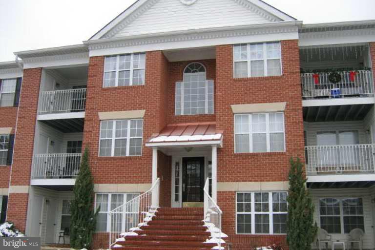 Well maintained 3rd floor Piney Orchard Condo with Gas fireplace and Sunroom. Master bedroom has full bath and walk in closet. Carpet will be replaced throughout prior to new tenant occupancy.