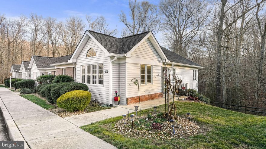 ***GRANITE COUNTERTOPS | STAINLESS STEEL APPLIANCES | LVP FLOORING*** This beautiful property is ready for its next owner! Conveniently located in the heart of Calvert County, this end unit has it all! Upon arriving to the property you will notice that this home is not only situated adjacent from the common area, which has gazebos, benched and picnic tables, but this home back to a wooded area offering privacy on those days spent on the oversized stone patio or upper deck! The main level of this property boasts LVP flooring, an open floor plan, vaulted ceilings, granite countertops, stainless steel appliances and tons of natural light! The main level also consists of a Primary Suite w/ ensuite bath, an additional half bath and a spare room (currently used as office) that provides access to rear deck! The lower level of this property has a large family/rec room with walkout to rear patio, a full bath, and a large storage area/laundry room. As mentioned prior this property is conveniently located close to shopping, dining and entertaining, is situated on a commuter route and is within close proximity to Pax River Naval Base, Andrews Air Force Base, and the rest of the DMV!