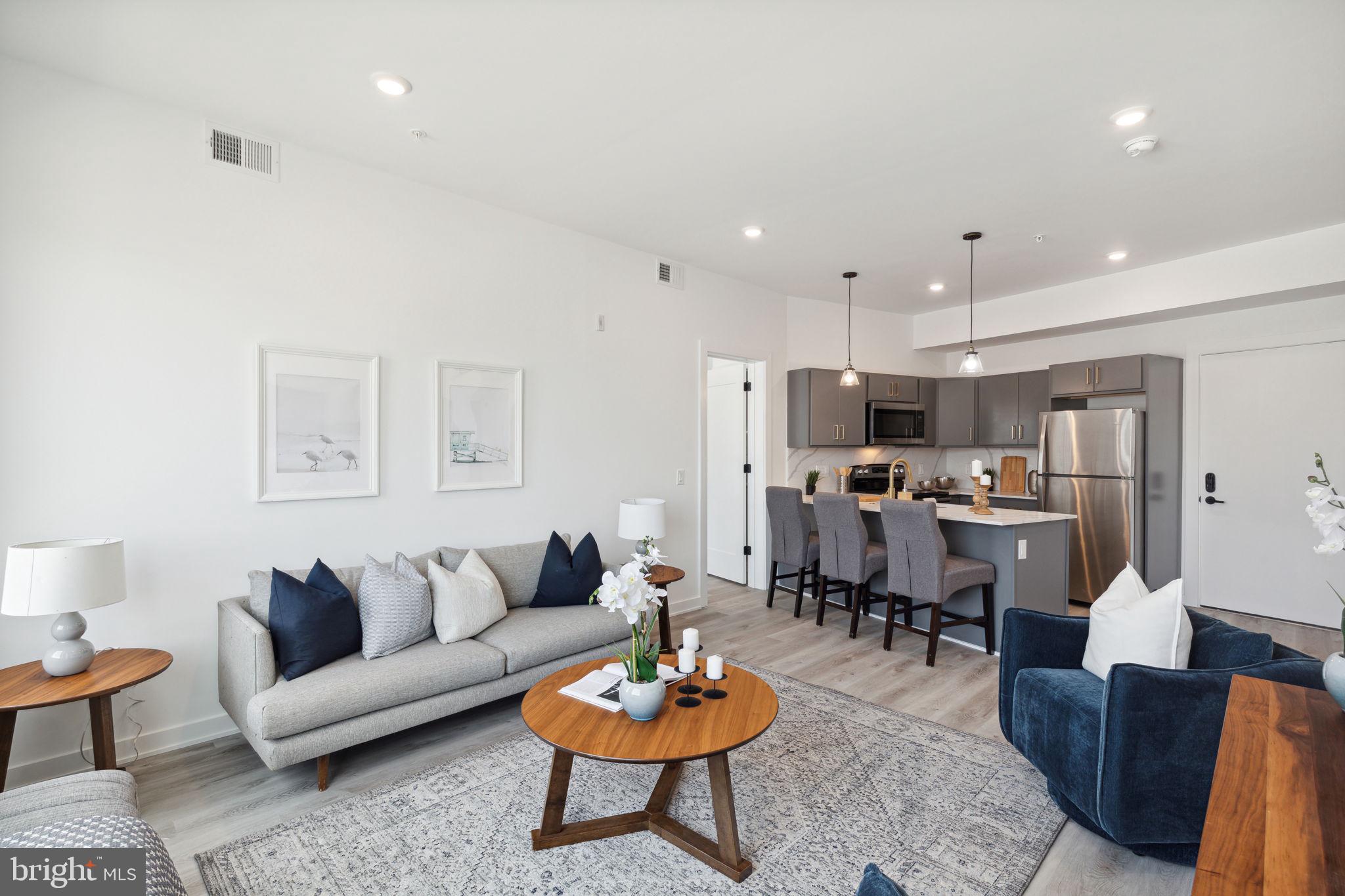 Available Now | Leasing Special: 1.5 months free for a 13 month lease - $1,750/gross rent, $1,548/month net effective rent. Unit #4C is a 2 bedroom, 2 bathroom apartment on the 4th Floor with a bright and spacious interior bursting with sleek fixtures throughout.
Welcome to Penn Reading! This gorgeous, professionally managed building is the perfect place for you to call home! Modern features collide with convenient living in these spacious 1 and 2 bedroom apartments, located in vibrant East Kensington. You’re sure to love the luxurious lobby showcasing an elevator and 2 separate stairwells for easy and secure access in and out of the building. An Amazon Digital Key Delivery Access ensures your packages will be delivered inside the building for added peace of mind. Conveniently equipped with central a/c for year-round comfort and in-unit laundry, each unit was custom engineered to offer peace of mind and well-being. The open floor plans provide a bright and airy atmosphere and ample room for you to customize your furniture arrangement. Enjoy kitchens that have never been used before and are fully equipped with cabinetry above and below, marble counters and backsplash, and sleek stainless steel appliances. Large windows offer abundant sunlight throughout and the bedrooms are sizable with sliding closet doors. The elegant bathrooms boast modern fixtures and lighted vanities with storage space. This beautiful rental won’t last long – call today to claim this gem as your own!
Please note: photos & video tour are from a similar unit within the building; exact layouts and finishes may vary.
Lease Terms:
Generally, 1st month, 12th month, and 1 month security deposit due at, or prior to, lease signing. Other terms may be required by Landlord. $55 application fee per applicant. Pets are conditional on owner's approval and may require an additional fee, if accepted. (Generally, $500/dog and $250/cat). Tenants responsible for: electricity, cable/internet, and a $55/month flat water fee. Landlord Requirements: Applicants to make 3x the monthly rent in verifiable net income, credit history to be considered (i.e. no active collections), no evictions within the past 4 years, and must have a verifiable rental history with on-time rental payments. Exceptions to this criteria may exist under the law and will be considered.
