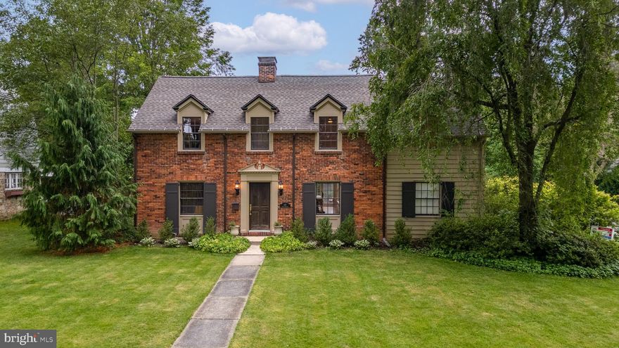 Historic Charm Meets Modern Luxury in Downtown State College

Discover a rare gem in the heart of downtown State College, just steps from Penn State University. Situated on a beautifully landscaped corner lot, this extraordinary home masterfully blends early 20th-century charm with the comfort and style of modern living.

A classic brick residence built in 1930, the home underwent a stunning transformation in 2018. Every detail was thoughtfully curated to preserve its historic integrity while introducing luxurious upgrades. Step inside to be greeted by rich hardwood floors, freshly painted interiors, arched doorways, soaring ceilings, exposed beams, and eye-catching brick accents, each element adding depth and character.

The inviting living room features a cozy wood burning fireplace and opens to the dining room, where a wall of windows drenches it in natural light. At the heart of the home is a chef-inspired kitchen, where reclaimed American chestnut brings warmth and history. Custom features include a 10 foot center island with seating and granite countertops, a farmhouse sink and mid-century modern lighting. Premium appliances like a GE Café refrigerator, Bosch dishwasher, and Wolf six-burner range with griddle and double ovens make this kitchen both stylish and highly functional. An adjacent wet bar with wine and beverage fridge is perfect for entertaining.

The kitchen flows seamlessly into a show-stopping great room with a dramatic 17-foot vaulted ceiling and a floor-to-ceiling Mendoza stone fireplace, crowned by a hand-hewn reclaimed wood mantle from an 1800s barn in Warren County. 

The main-level primary suite offers privacy and comfort with dual closets and a spa-like bath featuring radiant heated floors and a walk-in tile shower. A mudroom with custom built-ins, convenient half bath and a spacious laundry room with utility sink round out the first floor.

But the charm and historic features don’t end on the first floor!  Upstairs a charming bedroom boasts dual walk-in closets, gorgeous exposed brick and a unique ‘Juliet balcony’ overlooking the backyard.  The largest bedroom is enhanced by an original window that overlooks the sweeping great room. A third bedroom and two full baths complete this space.  
The finished lower level offers flexible space for hobbies or guests, featuring a large family room with two egress windows, rec room, full bath, and an additional bedroom with egress. 
Outside, a backyard oasis awaits with a seating area and fire pit atop a slate patio, surrounded by mature landscaping and privacy screens. Follow the pebble driveway to a show-stopping Carriage House, built in 2014 and offering an additional 1,800 square feet of living area. Currently serving as an exercise studio, this versatile retreat has endless potential: in-law suite, Airbnb, home office, art studio, teen hangout — the possibilities abound!

Need storage for cars, bikes, kayaks, or yard equipment? The electrified carriage doors open to function as a traditional garage. Complete with its own heat pump, central AC, and full bath, this distinctive dwelling isn’t just practical — it’s stunning. Historic beams and reclaimed wood from a 100+ year-old tree harvested from the property add soul and story to this one-of-a-kind structure.

The current owners have taken one of State College’s historic treasures, in a delightful downtown location, and transformed it into a modern retreat of innovation, tradition and beauty.  Don’t miss your chance to be a part of its story!