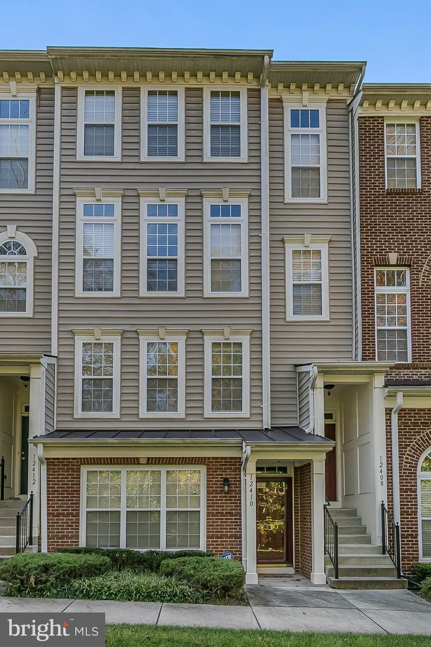 This home is a must see! The moment you walk in, it feels like home. You will be amazed by the nine foot ceilings within this open floor plan. The main level features a gourmet kitchen with stainless steel appliances, recessed lighting, shining granite countertops, and hardwood floors. The kitchen is combined with a bonus area that can be used as a eat-in breakfast room, office, lounge area and provides access to your private balcony. The kitchen area also includes a three-sided fireplace and is adjacent to a powder room.  The living room and dining room provides plush carpeting and bountiful space for entertaining or relaxing. The second level presents a laundry room, full bathroom, two comfortable bedrooms, and the Master suite. The large Master's suite possesses vaulted ceilings, enormous walk-in closet, luxury bathroom with dual sinks, separate spa tub, and shower. There is lower floor entry access from the garage. This home is a hidden gem and adjacent to Watkins Regional Park. Minutes from a plethora of restaurants, Largo Town Center Metro Station, major highways, The Woodmore Town Center at Glenarden,  and the upcoming University of Maryland Capital Region Medical Center. Lock in now on this prime location while you can!