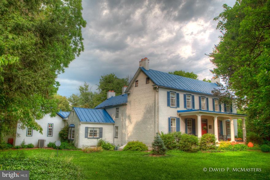 Mount Ellen INCREDIBLY BEAUTIFUL. Sited on 10 private park-like acres. 1760/1820 Brick 12 room home renov + additions in 2000. 8 FPs, HW flooring, ceramic tile, gourmet kit w/10ft fireplace, giant family room addition, library,dining room,  9+ft ceilings MBR suite  w/FP, Formal gardens, fountains, Guest house with apt. + 2 log bldgs. Stately, oh so elegant, yet comfortable.