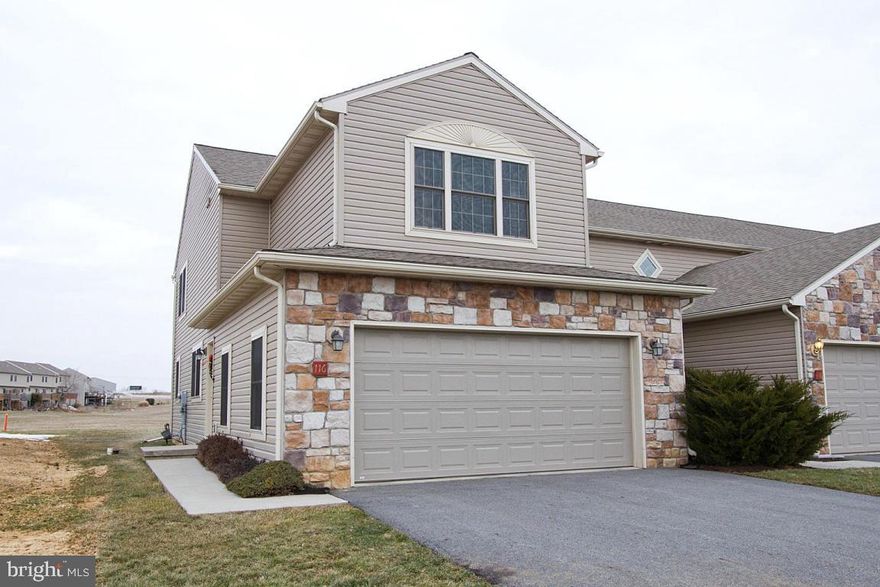 Built in 2008, this 1676 sqft 2 story END UNIT townhome with a full basement offers 3 bedrooms and 2 and half baths.  The open main floor features a comfortable living room, and a large kitchen with adjacent dining area opening up to a deck and a deep yard with nothing but open field beyond.