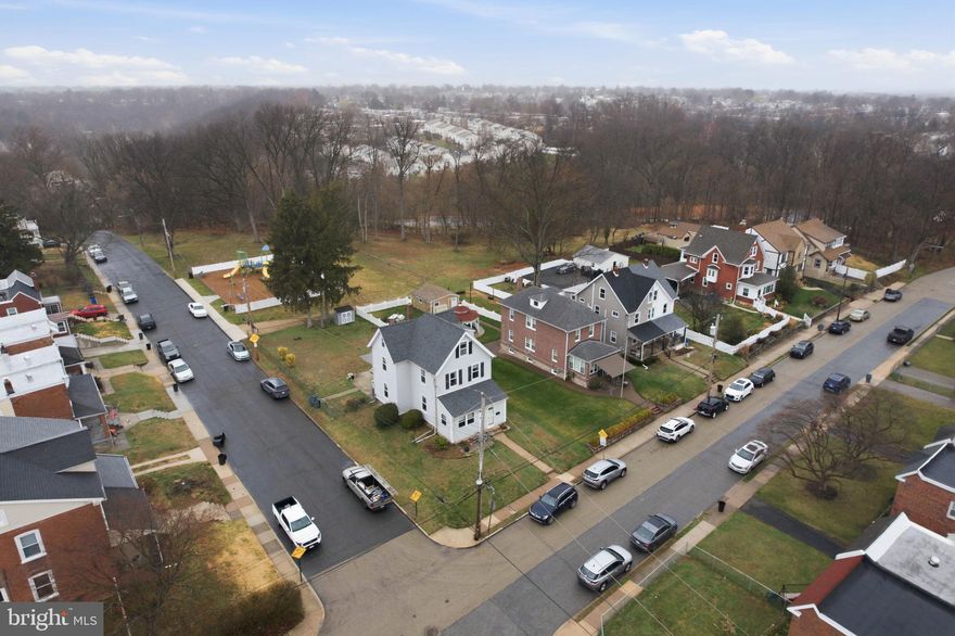 Welcome to 203 Fairview Ave in Clifton Heights—a beautifully updated corner property offering 4 bedrooms, 2.5 bathrooms, and a versatile layout designed for modern living. Start your tour on the inviting front porch, then step inside to a spacious interior featuring a highly desirable main-floor bedroom and convenient first-floor laundry. The large eat-in kitchen provides the perfect space for everyday living, hosting, and gathering. This home has been thoughtfully upgraded with major improvements,  mini split wit (2022), electrical upgrade and new panel (2022), sump pump (2022), all new windows (2023), and a brand new Trex deck with sliding glass doors (2025)—giving buyers peace of mind for years to come. Two bathrooms have been fully renovated, and the finished attic adds incredible flexibility with its own full bathroom and jetted tub—ideal for a , guest suite, home office, or private retreat. Situated on a generously sized, fenced-in corner lot, this property offers both space and privacy. As an added bonus, the home backs directly to a newly developed outdoor recreation area featuring a playground, walking trail, baseball field, and pickleball courts—perfect for enjoying an active lifestyle right outside your door.  Move-in ready with modern updates, functional space, and a prime location—this is one you don’t want to miss.