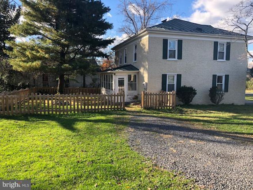 Enjoy village living & easy access to I-66. This charming 4 bedroom home has spacious rooms, high ceilings, a fenced yard and 2 relaxing porches. The traditional floor plan includes an eat in kitchen, formal dining, living & family room.  Walk to village shops, restaurants & more. Rental includes a separate workshop / storage building.  Pets considered on a case by case basis.  Breed restrictions for dogs.