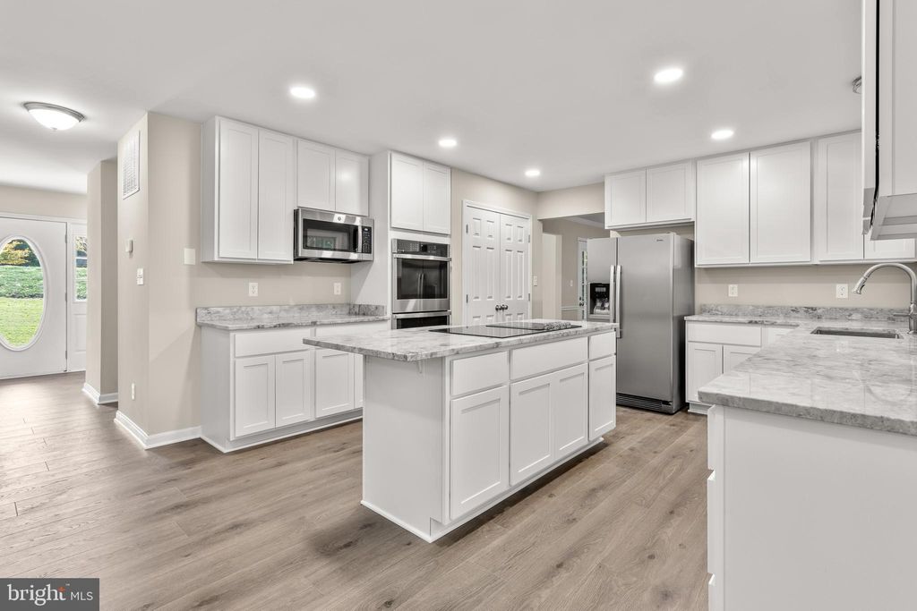 Photo of 3120 Queensberry Drive, HUNTINGTOWN, MD 20639 (MLS # MDCA2023938)