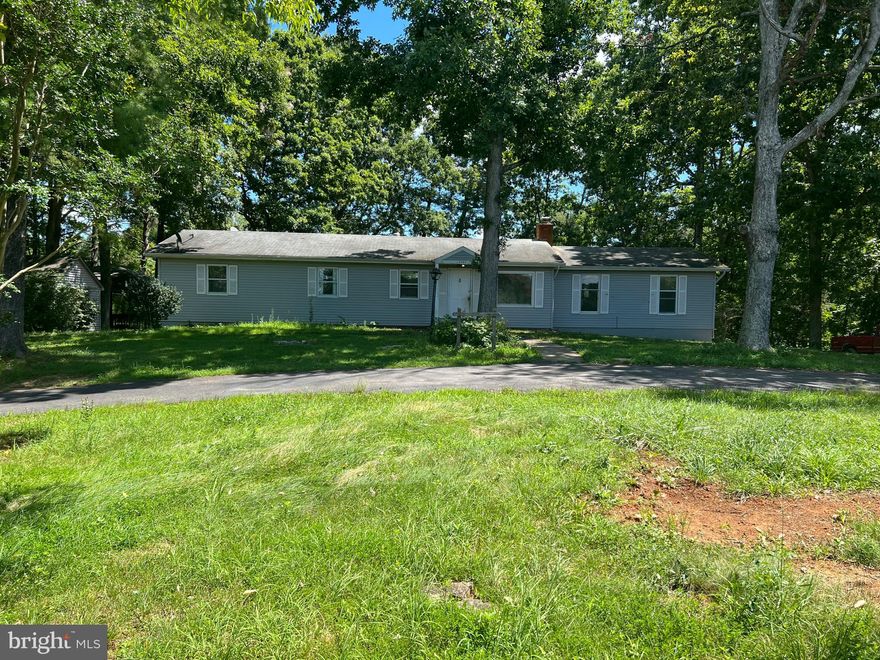 NEW 5-Ton  AC, NEW Painting, Exterior Staining, Lighting, Refinished & Ebony Stained Hardwood Floors in Dining Rm & Hallway (Custom Burnt Stained Hardwood Floors in bedrooms), Room Sizes are Large, (2) Circular Driveways (Front & Back), Plenty of Room for a Garden, 5.8 Acres (1.8 Acres around the home, additional 4 acres behind) Open Foyer,  Sep Dining Rm w/Hdwds, Chair Rail/Crown Mouldings, Unique Walk-In Linen Closet w/Built-In Shelving, 2 Guest Bedrooms share hall bath, Primary Bedroom w/Bath, Whole house Fan on main for spring & fall, Kitchen with Granite Counters, 42" Cherry Cabinets, Electric Cooktop & Double Wall Ovens, Table space or expand and add island, HUGE Walk-In Pantry with Shelves, (18x18) Sunroom off kitchen overlooking the backyard. Separate Living Room with large windows, Sep Den/Study/Office with Built-In Bookcases. Open stairwell to Basement from Foyer,  offers a big Recreation Room (23x20),  Wood Stove Insert/Fireplace All Brick (7.5' Hearth), Walk-Out Level to Backyard, Sink/Stovetop, and built-in cabinetry for? wet bar?  Game Room for (darts, pool table, etc) Bonus Room or (NTC 4th bdrm), Laundry Room w/Sink & Shelving. Craft or Decor Storage/Sewing Room with Shelving, Extra Storage Area, Desk Area-Do you Collect Wine-would make a Perfect Wine Cellar! 3rd Full Bath with Tub/Shower Combo & Built-in Shelving. Covered area for Yard Equipment or Stack Wood to stay dry under the sunroom, Huge Back Deck with a Custom Screened Porch w/Electricity, would make a great entertaining area or possible hot tub. Sep well-house building w/interior heater. The list goes on & on, (want animals/chickens/horses? Plenty of Room for all 3 & More! FYI only 15 mins to downtown Warrenton, w/Shopping, Restaurants & Major Hospital. 20 Mins to downtown Culpeper,   AS-IS, Home is part of an estate & Trust, Inspections for Informational Purposes Only