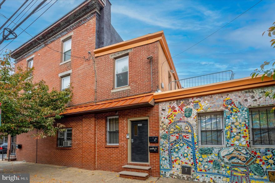 Looking for a standout investment in the heart of South Philly? Welcome to 1183 S. 13th Street, where real estate meets artistry. The exterior is a true showstopper, wrapped in an iconic mosaic by world-renowned artist Isiah Zagar, creator of Philadelphia’s Magic Gardens. This property isn’t just a building, it’s a landmark.

Inside, you’ll find four income-producing units (all currently rented): two modern one-bedrooms and two two-bedrooms, with features like ductless splits, in-unit washer/dryers, hardwood floors, and stylish finishes. One unit also offers the flexibility to expand for owner occupancy or keep as-is for steady tenant income.

Located in coveted Passyunk Square, steps from Columbus Park, Bella Vista, and the Italian Market, this fully occupied property is surrounded by some of Philly’s best dining, cafés, and shops—making it as attractive to renters as it is to investors.

1183 S. 13th Street combines iconic art, prime location, and strong returns—an unmissable addition to your portfolio.