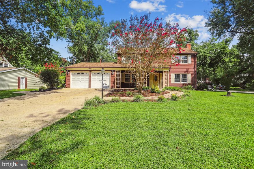 OPEN HOUSE: Sunday 8/28/2022 1pm - 3pm
Welcome Home, come see Bowie’s best new listing. This 3bedroom 3bath, 2200 sqft. luxurious traditional colonial features beautiful landscape, mature crepe myrtles, and big blue-sky views. This captivating home is turnkey with Brand NEW carpet, laminate floors, and top to bottom fresh paint. Enjoy the peace and privacy of the oversized corner lot/cul-de-sac. Greet friends and family on your covered front porch and break out the BBQ for a get together on the impeccable custom-built patio inside the large Mid-Atlantic Fencing fenced in backyard. Pull into the two-car garage to keep your vehicles clean and dry, the sizeable space includes a bonus refrigerator, worktable, and cabinets with easy access to the kitchen. The kitchen boasts NEW built-in Stainless-Steel appliances, Kitchen Aid double wall oven, the big bay window above the sink provides a grand view of the lush green backyard. On cold winter days, grab a hot drink and enjoy the gas fireplace in the rustic Great Room with its vaulted wood beam ceiling or head over to the expansive living room and enjoy the brick wood burning fireplace. This home gets ample natural light throughout the property. Walk into the spacious owner’s suite with his and hers closets and a newly remodeled owners suite bathroom with custom tiling. This home is updated with a new central heating system, hot water heater, covered gutters, Prestique 40-year roof, aggregate concrete driveway and walkways. This home is a short distance from the Bowie metro station, White Hall swim club, Bowie gold club, Bowie State University, Allen Pond Park, and Bowie Town Center.