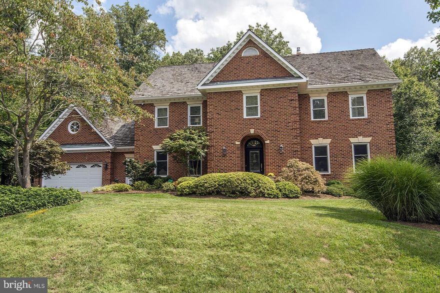 AMAZING NEW PRICE! NEWLY RENOVATED, GOURMET KITCHEN, ALL NEW BATHS INCLUDING FABULOUS MASTER BATH WITH OVER-SIZED STEAM SHOWER ,SEPARATE TUB. DRAMATIC 2 STORY FR OPEN TO KITCHEN & SEPARATE BREAKFAST ROOM. BRIGHT WALKOUT LL WITH 2 BR & 2 NEW  BA'S, REC ROOM W/BAMBOO FLOORS, FIREPLACE & WETBAR CLOSE TO AN ACRE WITH  LOVELY PATIOS & DECK BACKING TO TREES. GENERATOR