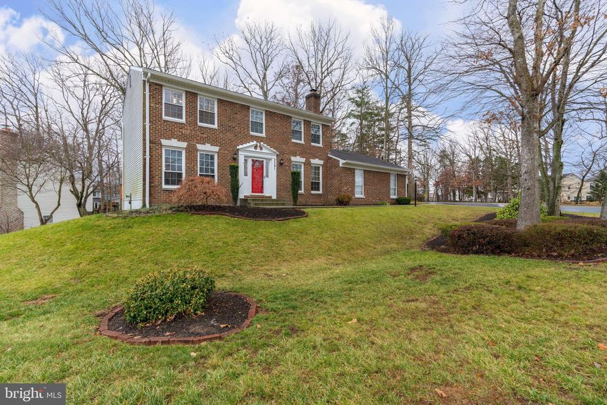 Stately home well appointed on a manicured, corner lot bordered by trees in sought after Lake Ridge subdivision with new walkway and front entry steps installed in 2018. Hardwoods throughout main level's freshly painted open floor plan. Enter into Living Room, connected to Dining Room, to gourmet, country Kitchen (remodeled in 2013) to Family Room with exposed beams, wood burning fireplace and walk out to rear deck overlooking yard that backs to trees. Enter attached 2 car garage from Laundry Room on main level. Master Bedroom Suite features a walk in closet and beautiful master on-suite bathroom remodeled in 2018. Newer plush carpet throughout upper level. 3 additional bedrooms and 1 additional bathroom on upper level. New carpet in lower level (2018) with full bath with stall shower, legal bedroom and spacious Recreation Room with walk out. Located in well maintained, social and neighborly street. Rear deck is especially spacious for outdoor entertaining. Excellent commuter access to I95 and Rte. 123. HOA includes membership to 6 Lake Ridge Pools. Close to the best shopping: Groceries (Wegmans, Costco, Food Lion, Giant, Aldi, and Lidl), Malls (Potomac Mills Outlet Mall, Stonebridge Shopping Centre), Home improvement (Home Depot, Lowes), Variety of restaurants and .5mi. to Starbucks. Easy access to 95, HOV, VRE, and Commuter lot. Close to Lake Ridge Park, hiking trails to Occoquan, 11mi. to Leesylvania Park (incredible beach area in the summer) and fishing. 4mi. to Historic Downtown Occoquan, 25 minute commute to Ft Belvoir, 25 minute commute to Quantico, 24 mi. to Pentagon. *****All offers due if any by 1/13 at 5PM.******