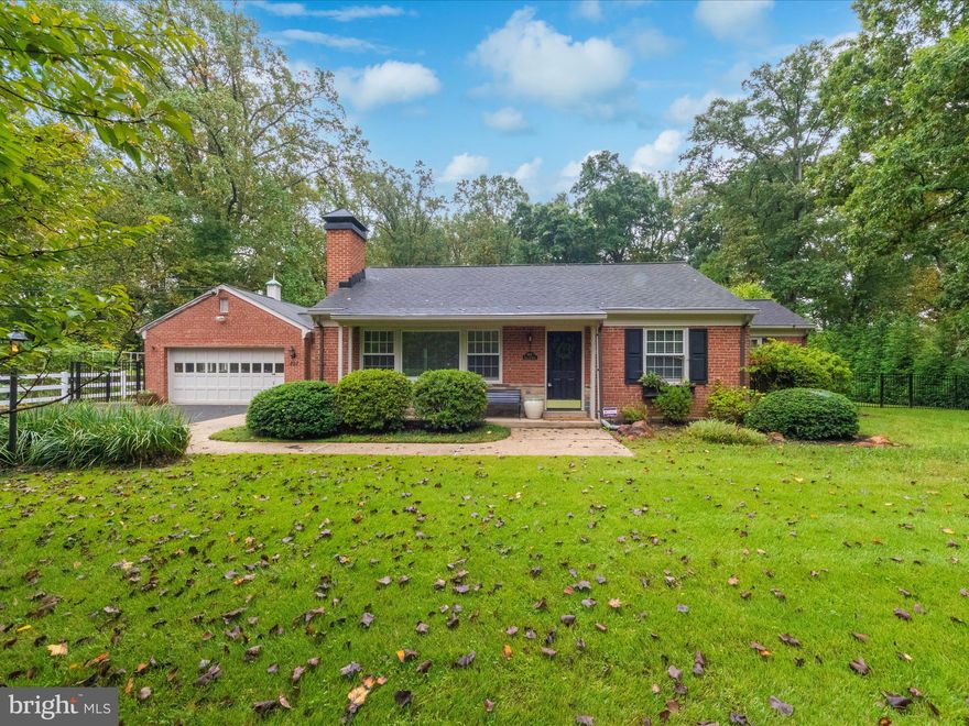 Nicely updated, charming and so highly captivating one level Brick turn key home! Spectacular, beautiful deep  wooded park like  lot of nearly 1 acre. Attached 2 car garage  affords endless expansion possibilities. Additional covered parking in the expansive rear fenced yard. Minutes to Glenmont Metro, easy access to 495, ICC, shopping, parks, playground, trails, community pool, major commuter routes. "Generac" backup generator, recent composite deck, newly finished herringbone pattern wood floors, s.s. appliances, Walnut kitchen cabinets, granite counters, energy efficient induction range, custom built in's in primary bedroom, interior exposed brick mudroom, wood burning fireplace insert, tankless energy efficient Bosch hot water heater.