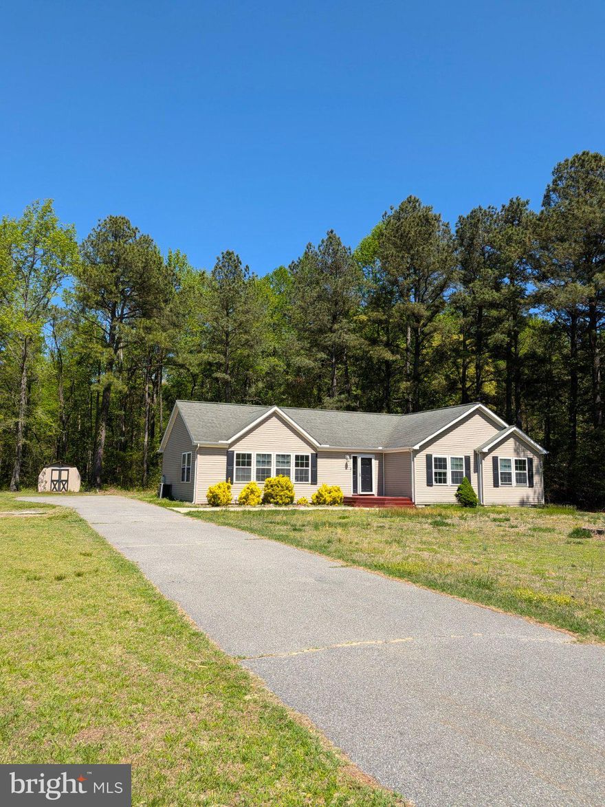 Discover this charming ranch-style home nestled on a generous 2.1-acre lot. With 1,985 sq. ft. of thoughtfully designed living space, this detached residence features 3 spacious bedrooms and 2.5 bathrooms, perfect for comfortable living.  Enjoy the serene surroundings and the potential for outdoor activities on your expansive lot. The open layout invites natural light, creating a warm and welcoming atmosphere throughout. This property is ideal for those seeking a peaceful retreat with room to grow. Whether you envision a garden, outdoor entertaining space, or simply a place to unwind, the possibilities are endless. Conveniently located with easy access to local amenities, this home combines tranquility with accessibility. Don't miss the opportunity to make this delightful property your own! Motivated sellers so submit your offers. Home is being sold As Is, there's NO known major repairs. Sellers just want to sell.  List agent related to seller.