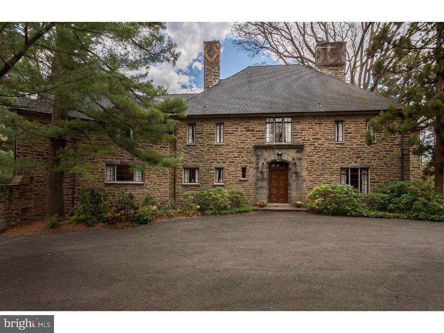 Handsome Chestnut Hill stone home beautifully sited on 1.5 acres, in the coveted Morris Arboretum neighborhood. This is a rare opportunity to become just the third owner since it was built in 1928. Designed by Philadelphia architects Edwards and Hoffman, with exceptional 20th century architectural details. Features include a warm, welcoming entry hall, dramatic walnut spiral staircase, grand step-down living room, and pine paneled dining room and library, each with a wood burning fireplace. Kitchen, butler's pantry and breakfast room just waiting for your personal touch. Fabulous light-filled master suite, including bedroom with fireplace, dressing room and bath. Four additional bedrooms, two baths complete the second floor, with playroom/office on the third floor. Front courtyard with ample parking, three car detached garage with office above. Spectacular, 250 year old white oak shades the two tiered flagstone terrace, overlooking a mature woodland garden with specimen planting that include sazaleas, viburnum and award winning rhododendrons. Enjoy the utmost privacy, a short stroll to the Arboretum, and minutes away from Chestnut Hill shopping, restaurants, schools, and the Wissahickon trails. This is an absolute gem, in a very desirable location, which is not to be missed!