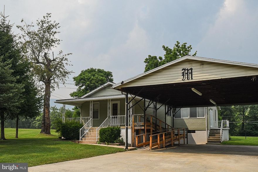 Wonderfully maintained raised rancher nestled in the heart of Cresaptown.  If one level living is what you're looking for, look no further!  All three bedrooms, the full bath with step-in shower, AND laundry are all located on the first floor--accessible from your MASSIVE carport via a ramp or small set of steps.  The yard is large and level, perfect for anything you'd like to do!