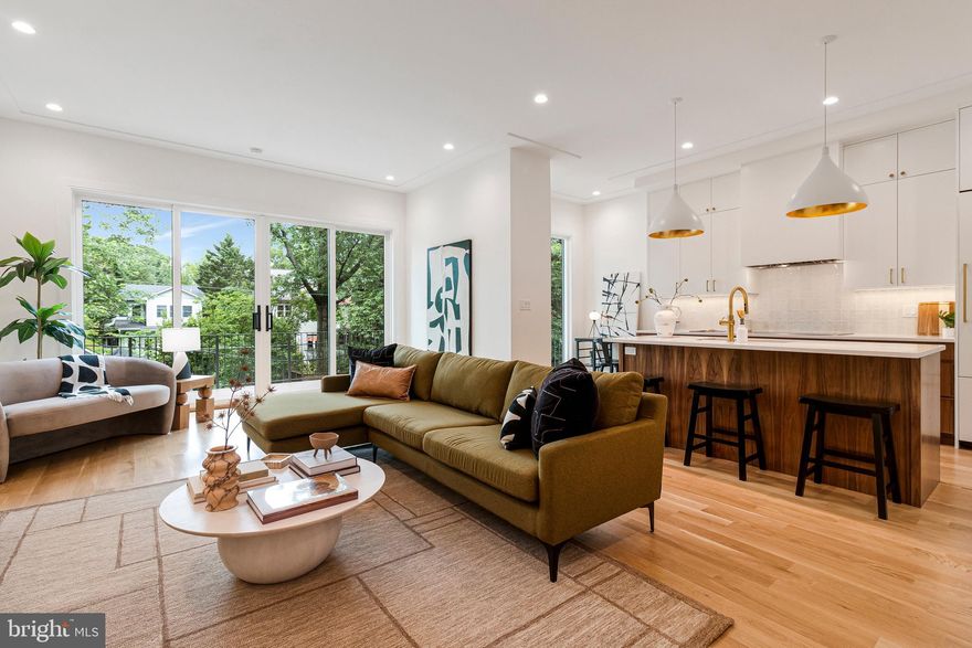 Highest Quality Building and Materials by local firm AllenBuilt.

6 Beds + Bonus Spaces | 4.5 Baths | Two Decks | Garage + Off Street Parking | Four Finished Levels

Discover this exquisitely reimagined home in the heart of Chevy Chase within walking distance of Lafayette-Pointer Park + School, Broad Branch Market, and Rock Creek Park.

Enjoy a sensational floor plan designed for the best of modern living. The first level includes a large foyer with a generous closet/mudroom, a living room with a fireplace, and a formal dining room with a butler’s pantry. The phenomenal kitchen/family room is complemented by large-scaled windows, high ceilings, and has its own breakfast area. Just off of the kitchen is an expansive deck overlooking the landscaped rear yard.

The second level is home to a luxurious primary suite with a double vanity, soaking tub, and a dreamy walk-in closet. There are two additional bedrooms on this level, both of which include walk-in closets and are serviced by a hall bath with a double vanity. This level also has a proper laundry room with a sink.

The third floor offers tremendous versatility and includes two bedrooms, both of which have access to a deck. There is also a full bath, and a large flexible room which could serve as a playroom or teenager hang-out.

The fully developed walk-out lower level features a spacious, light-filled recreation room, bedroom, full bath, and bonus rooms for home office/gym and storage.

The rear yard combines space for dining al fresco, play, and gardening. For easy coming and going enjoy a garage in addition to off street/driveway parking with an electric car charger.

This home has been designed to offer an immense amount of storage and versatility.