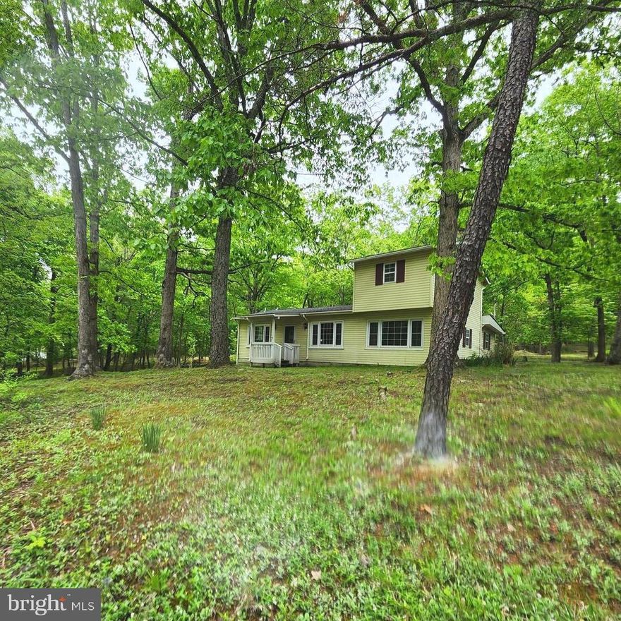 Welcome to 7 McGuire Circle! This 3 bedroom, 2 bath home offers a main level primary bedroom, large main level laundry/mudroom, living room with a wood burning stove and a level  1/2 acre lot with paved parking and a large storage shed. Neighborhood is convenient to Lake Shannondale, and public access to the Shenandoah River and Appalachian Trail. Just minutes from Historic Harpers Ferry and Charles Town. Schedule your showing today. This property is eligible under the Freddie Mac First Look Initiative through June 3, 2023. No investor offers will be considered prior to that date.